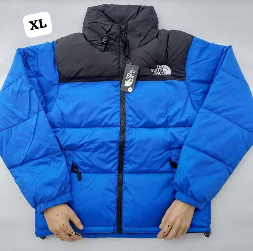 Chaqueta north face azul detalles negros logo blanco