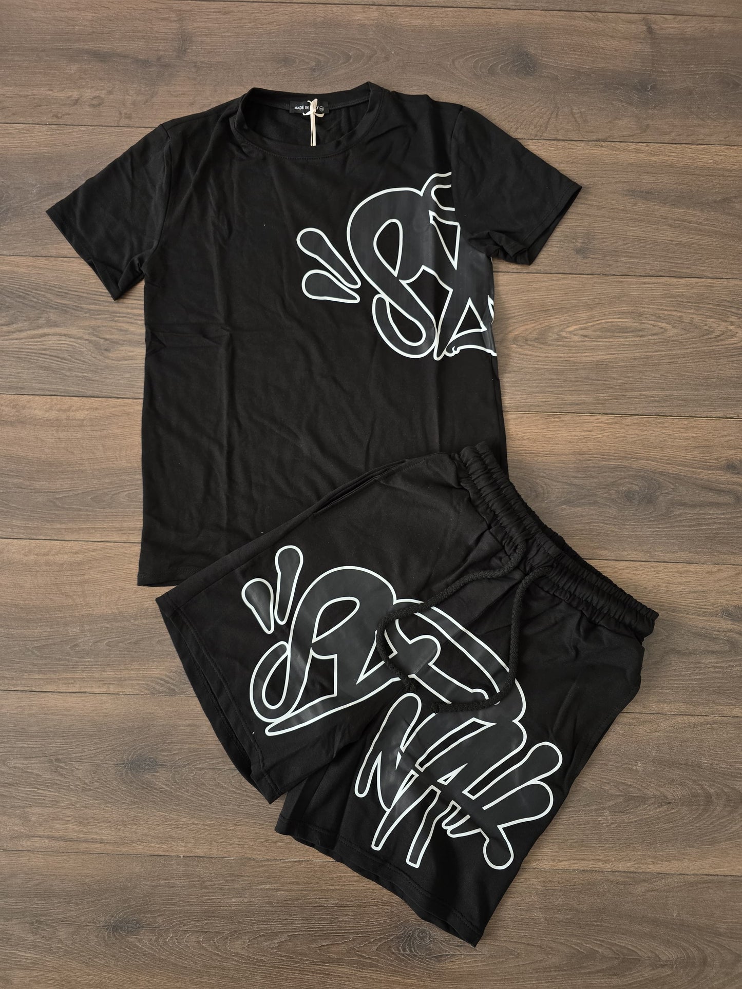 Conjunto verano syna negro bordes blancos