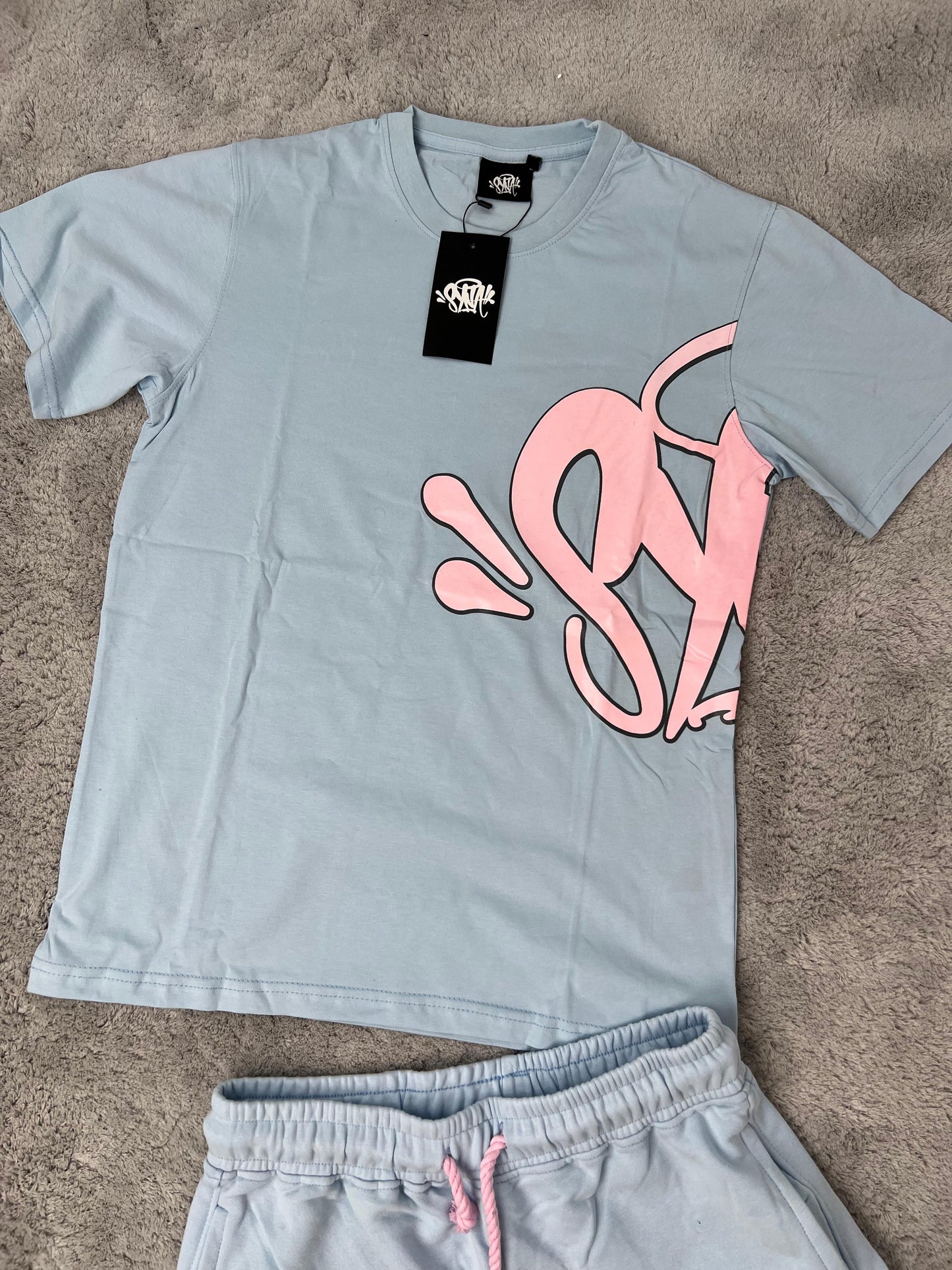 Conjunto corto syna azul logo rosa