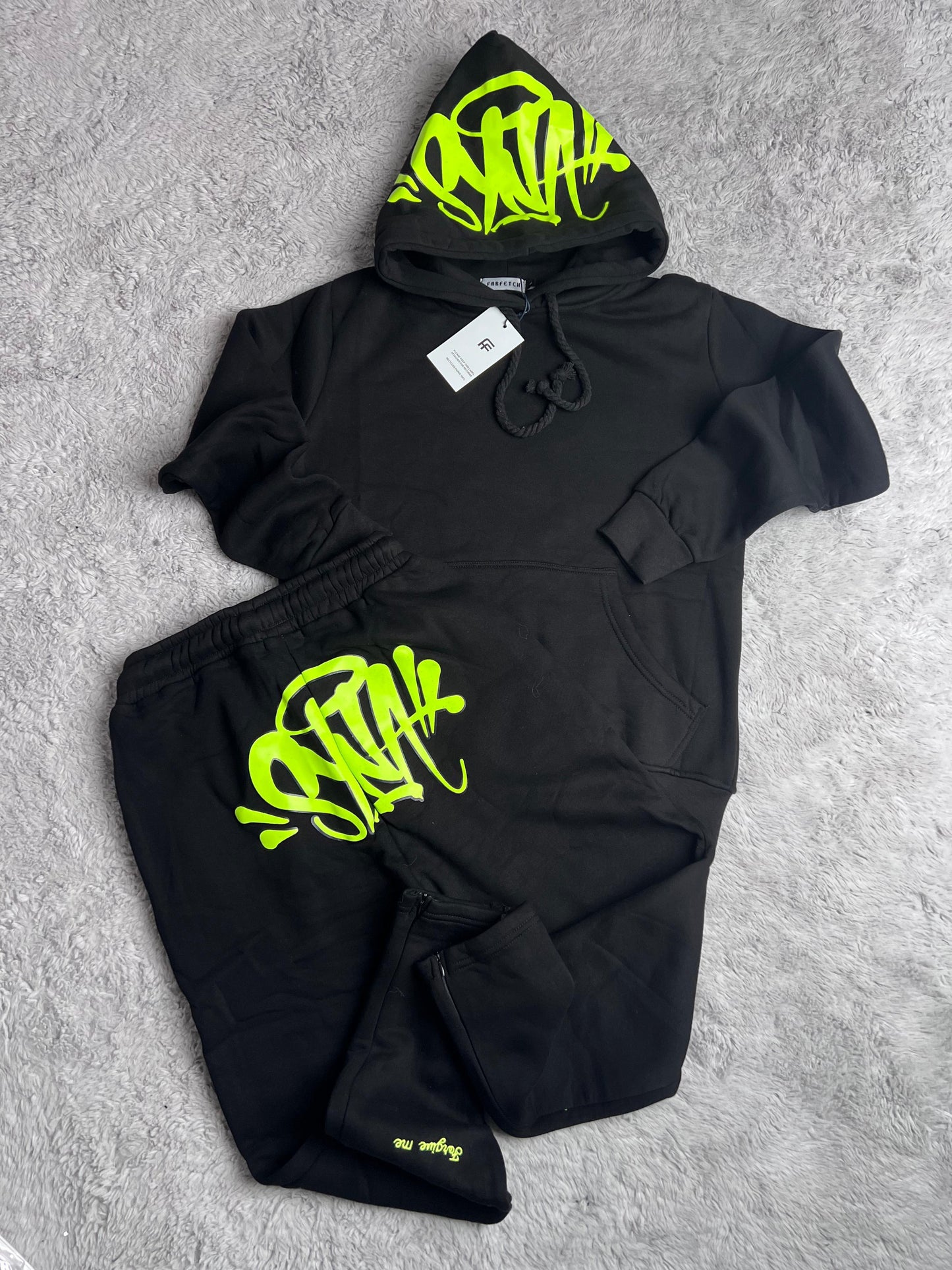 Chandal SYNA WORLD negro logo verde