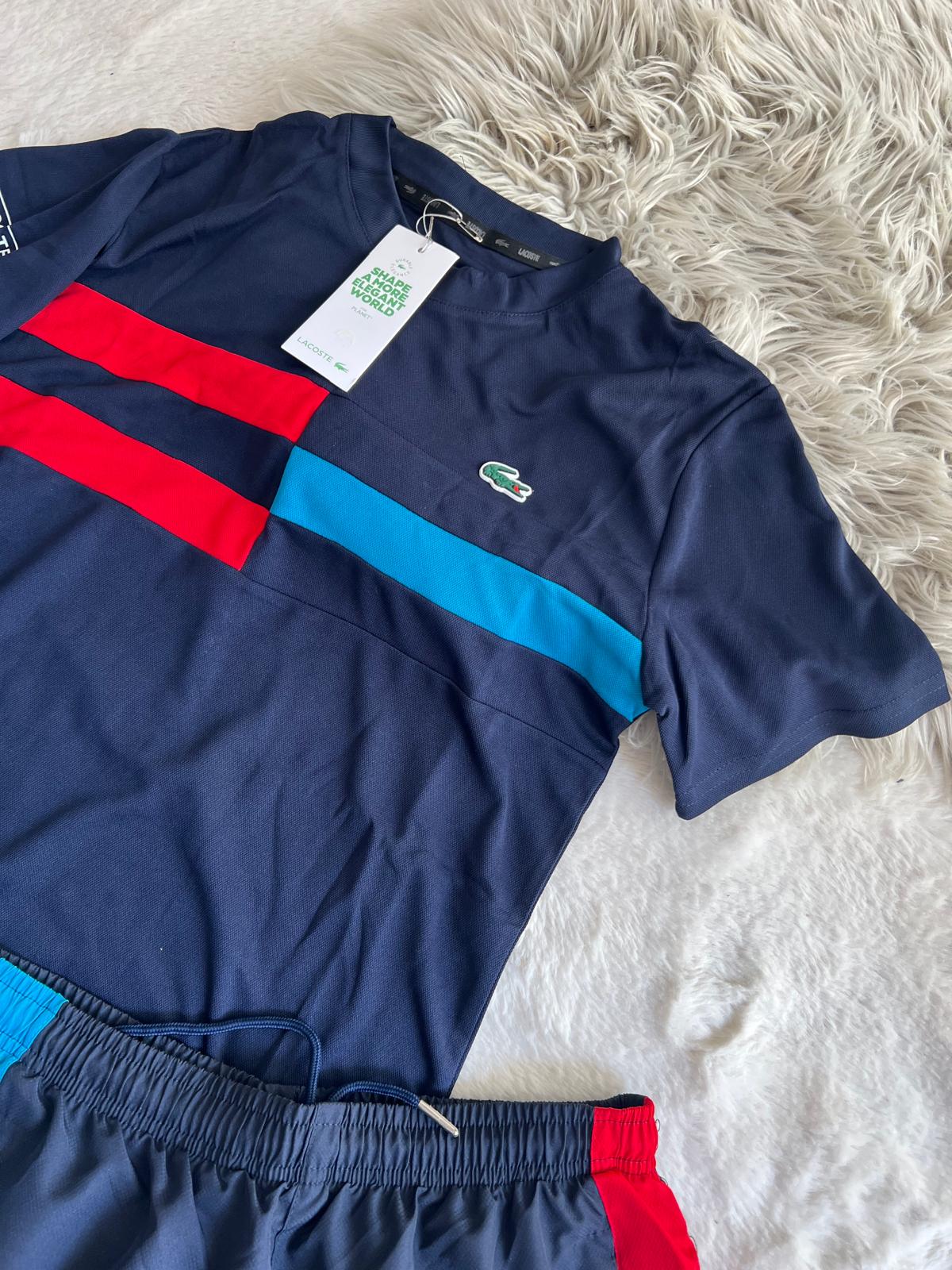 Conjunto corto lacoste negro detalles azules y rojos