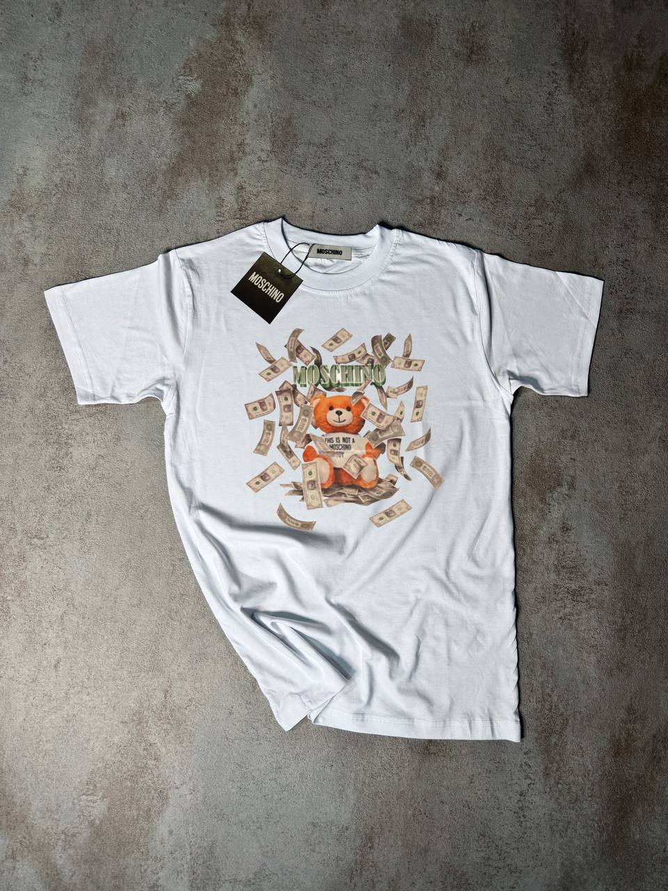 Camiseta Moschino blanco logo verde billetes oso en medio