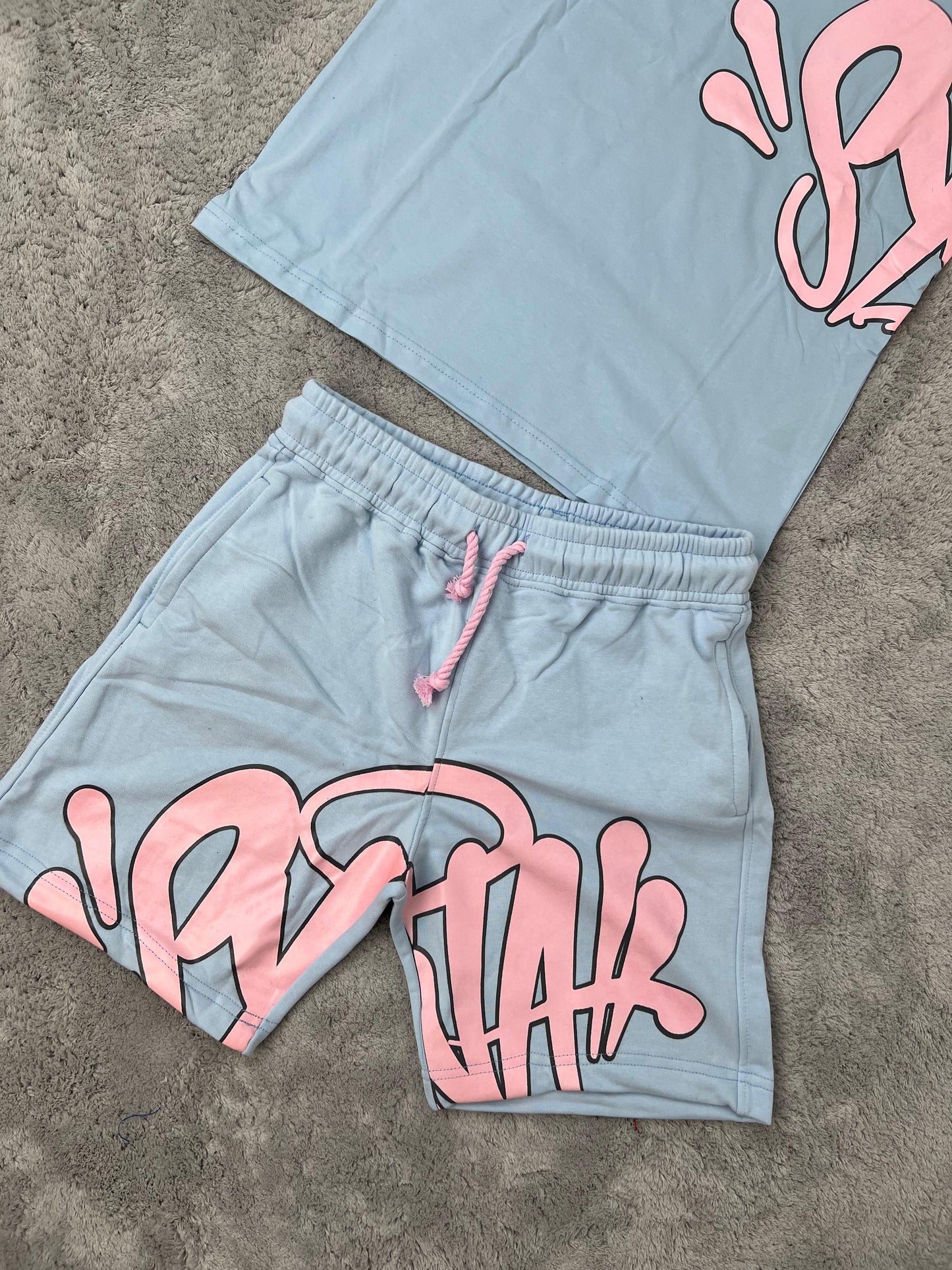 Conjunto corto syna azul logo rosa
