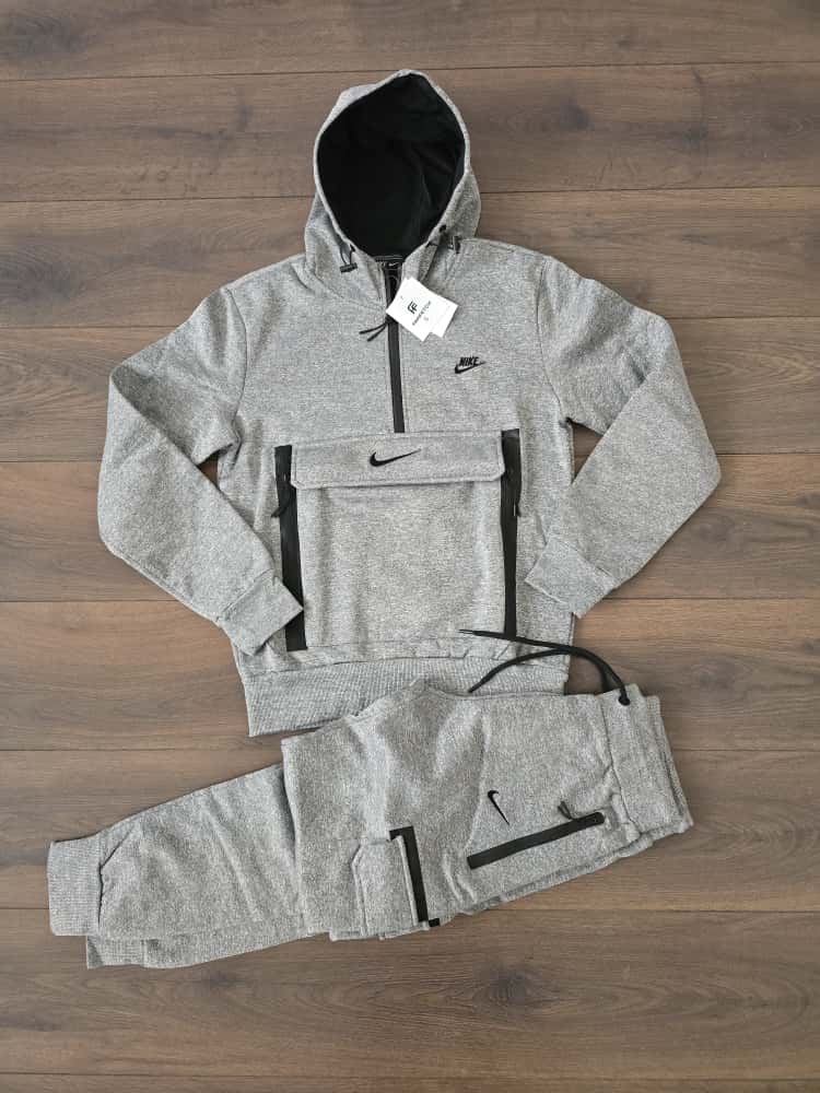Chandal Nike bolsillo delantero gris
