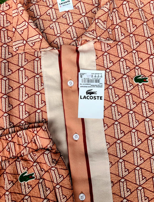 Conjunto lacoste rosa y blanco