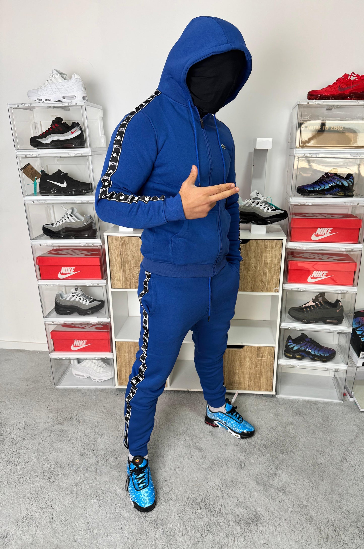 Chandal Lacoste azul tiras negra logo verde