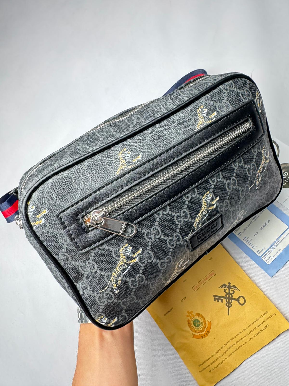 Riñonera GUCCI negro logo gris tigres