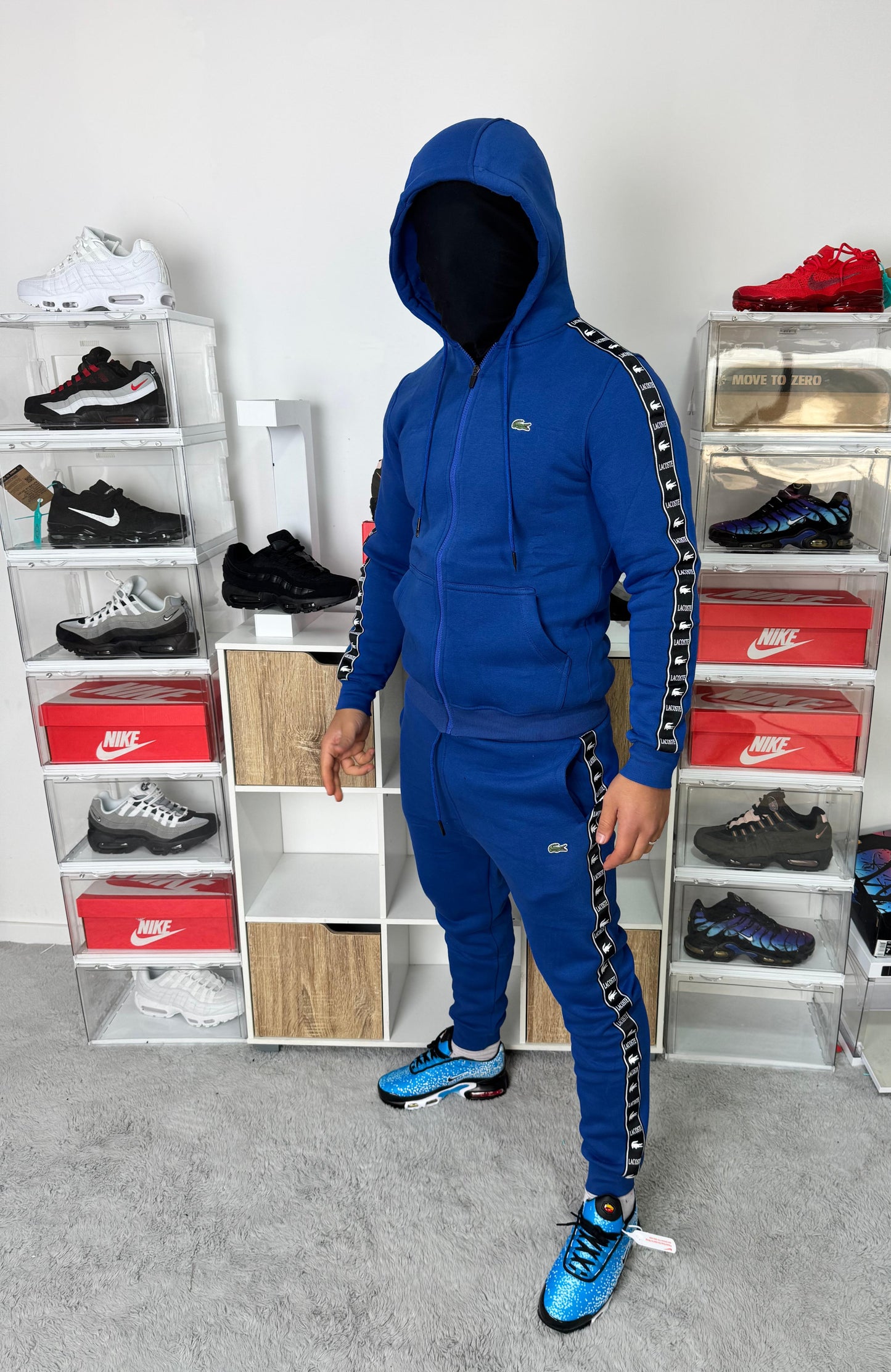 Chandal Lacoste azul tiras negra logo verde