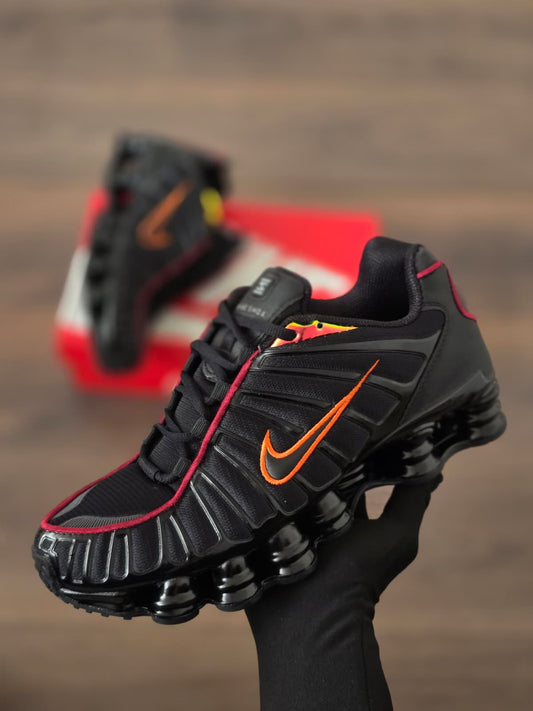 Shox negra logo naranja