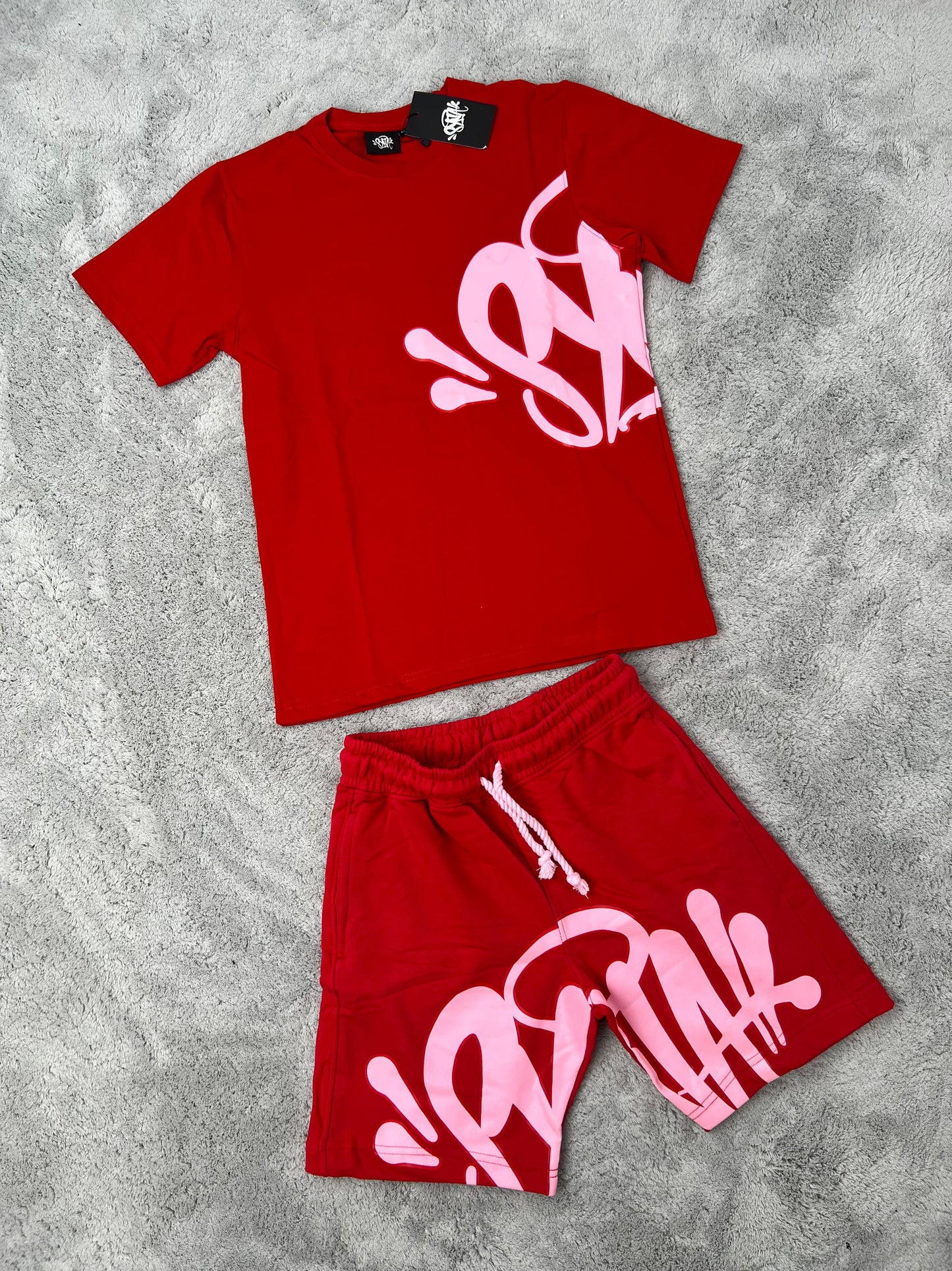 Conjunto corto syna rojo logo rosa