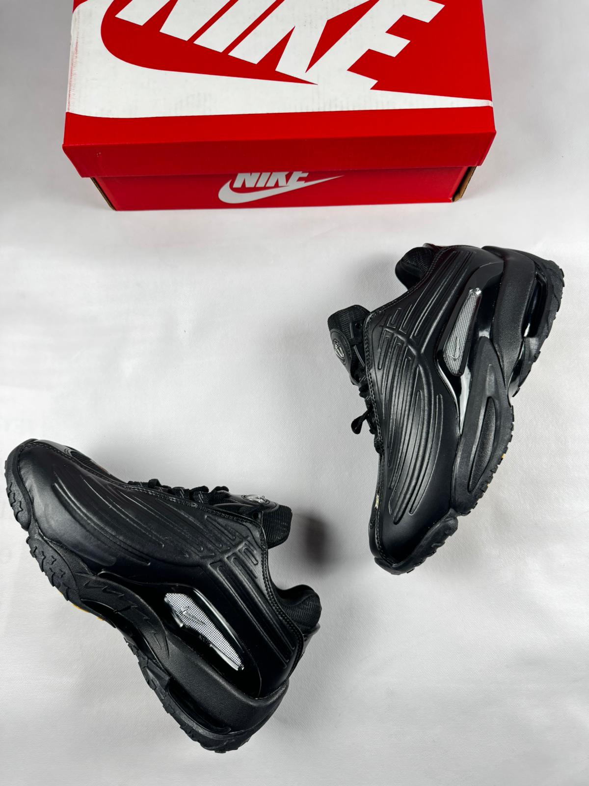 Nike nocta negro detalles grises