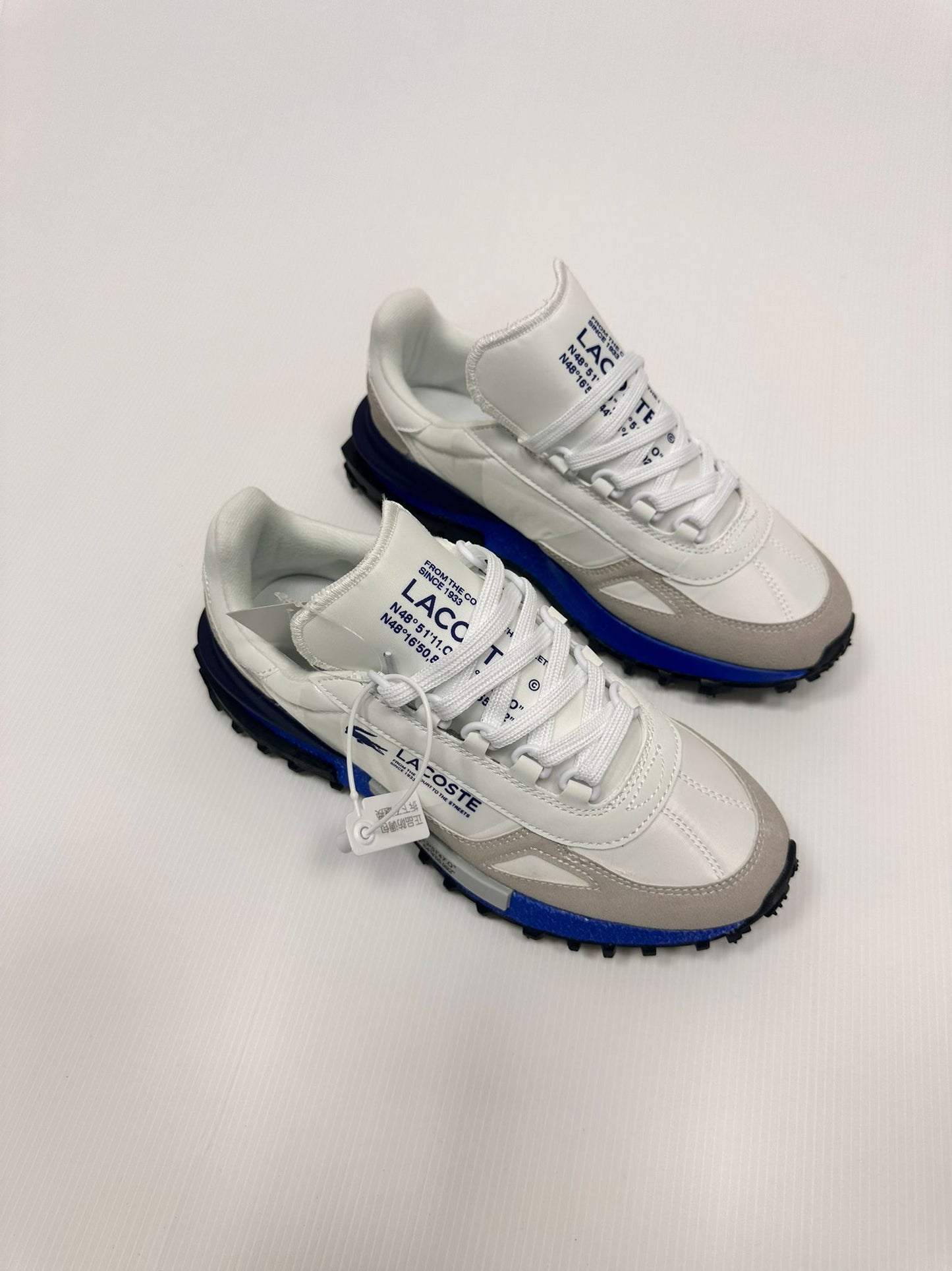 Zapatillas Lacoste blanco y gris logo azul