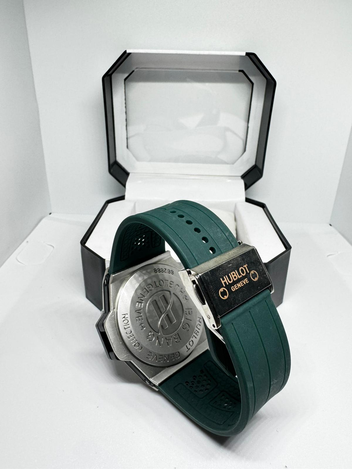 RELOJ HUBLOT NEGRO Y PLATEADO CORREA VERDE