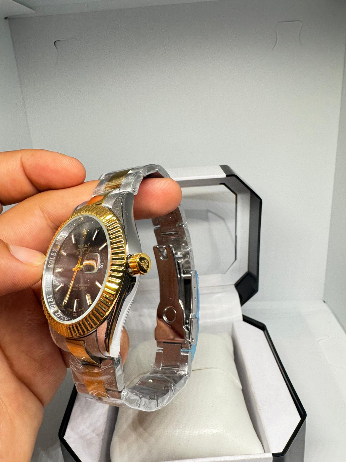 RELOJ ROLEX NEGRO Y PLATEADO DORADO DETALLES BLANCOS
