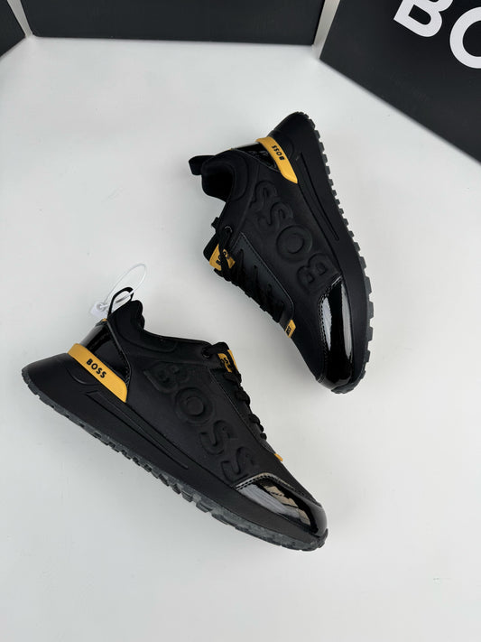 Hugo Boss negras detalles dorados