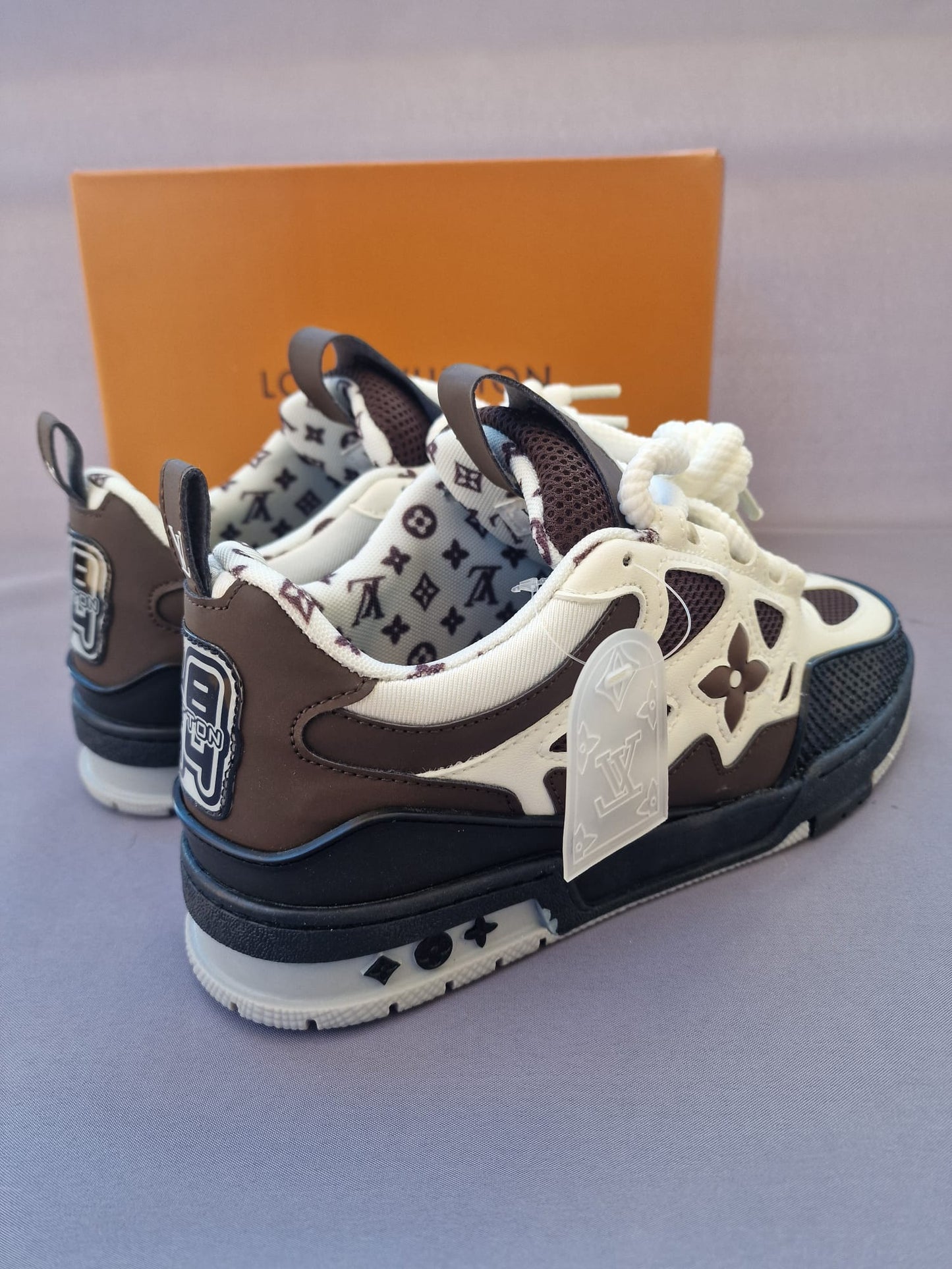 Louis vuitton trainer 2025 blancas marrones y negras