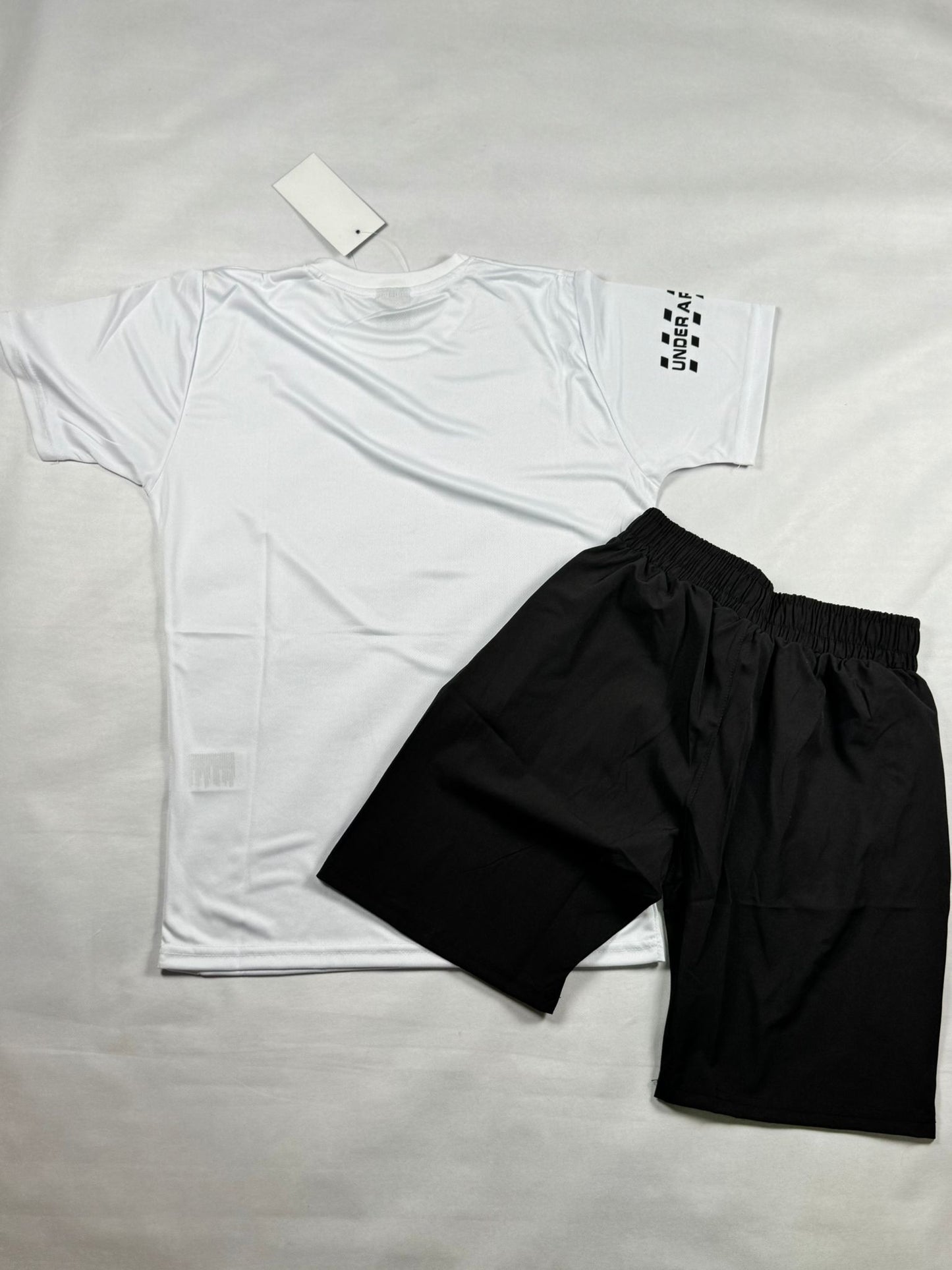 Conjunto under armour blanco logo negro