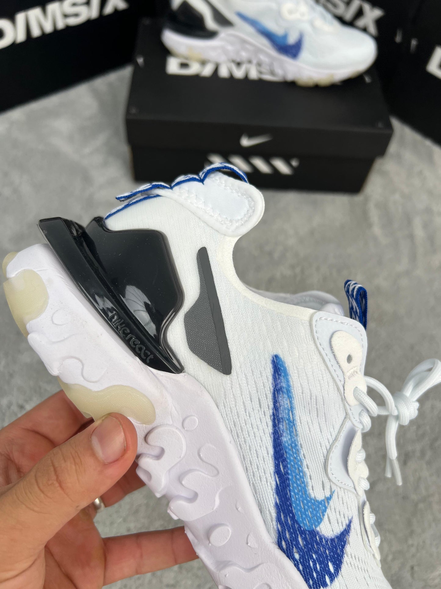 Nike react vision blancas doble logo azul