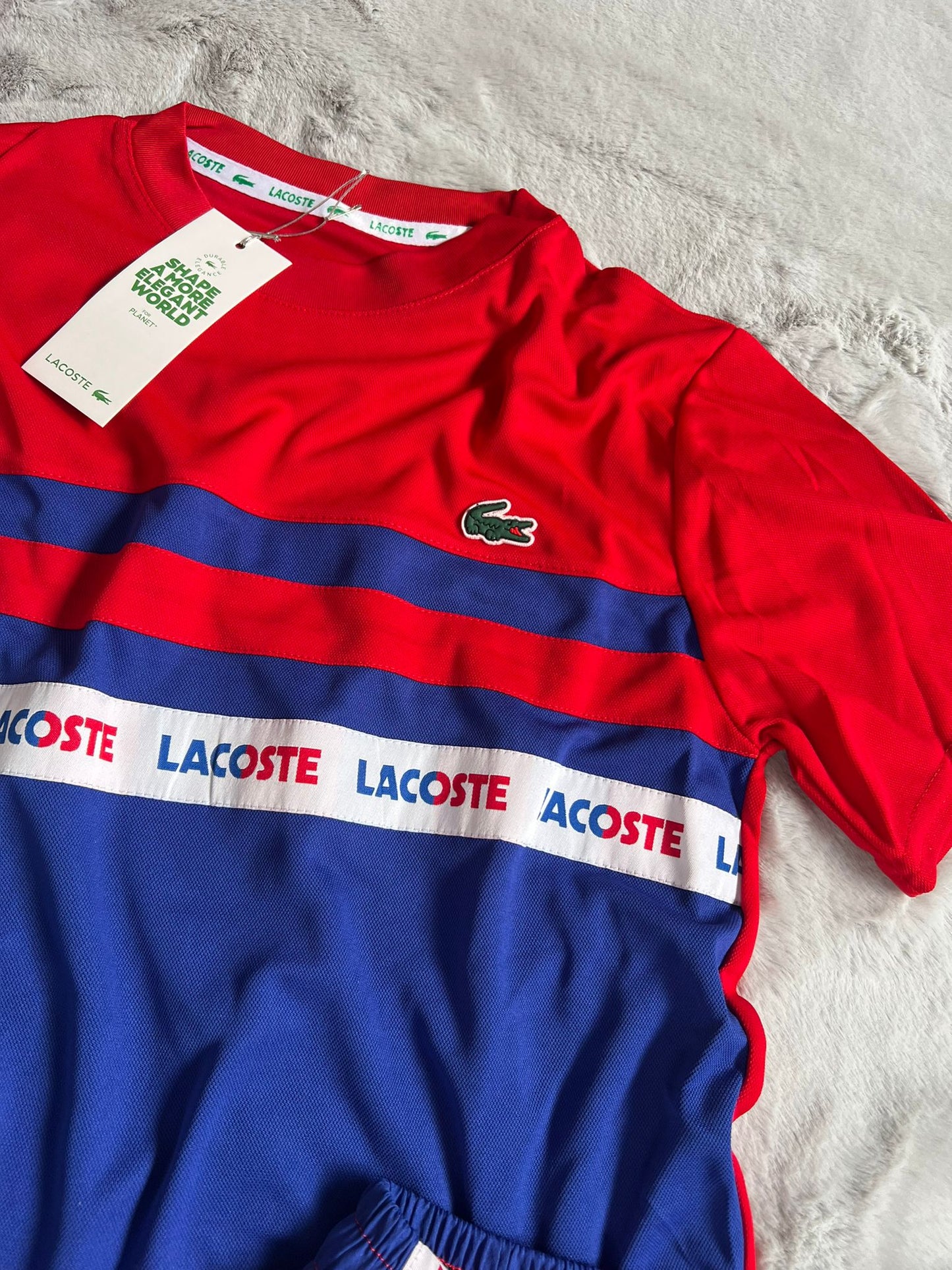 Conjunto corto lacoste azul marino y rojo logo verde