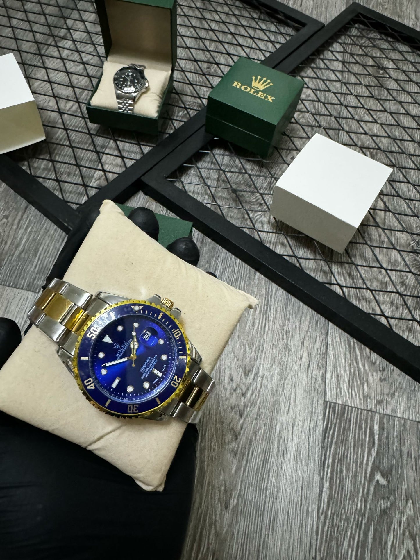 Reloj Rolex azul plateado y dorado