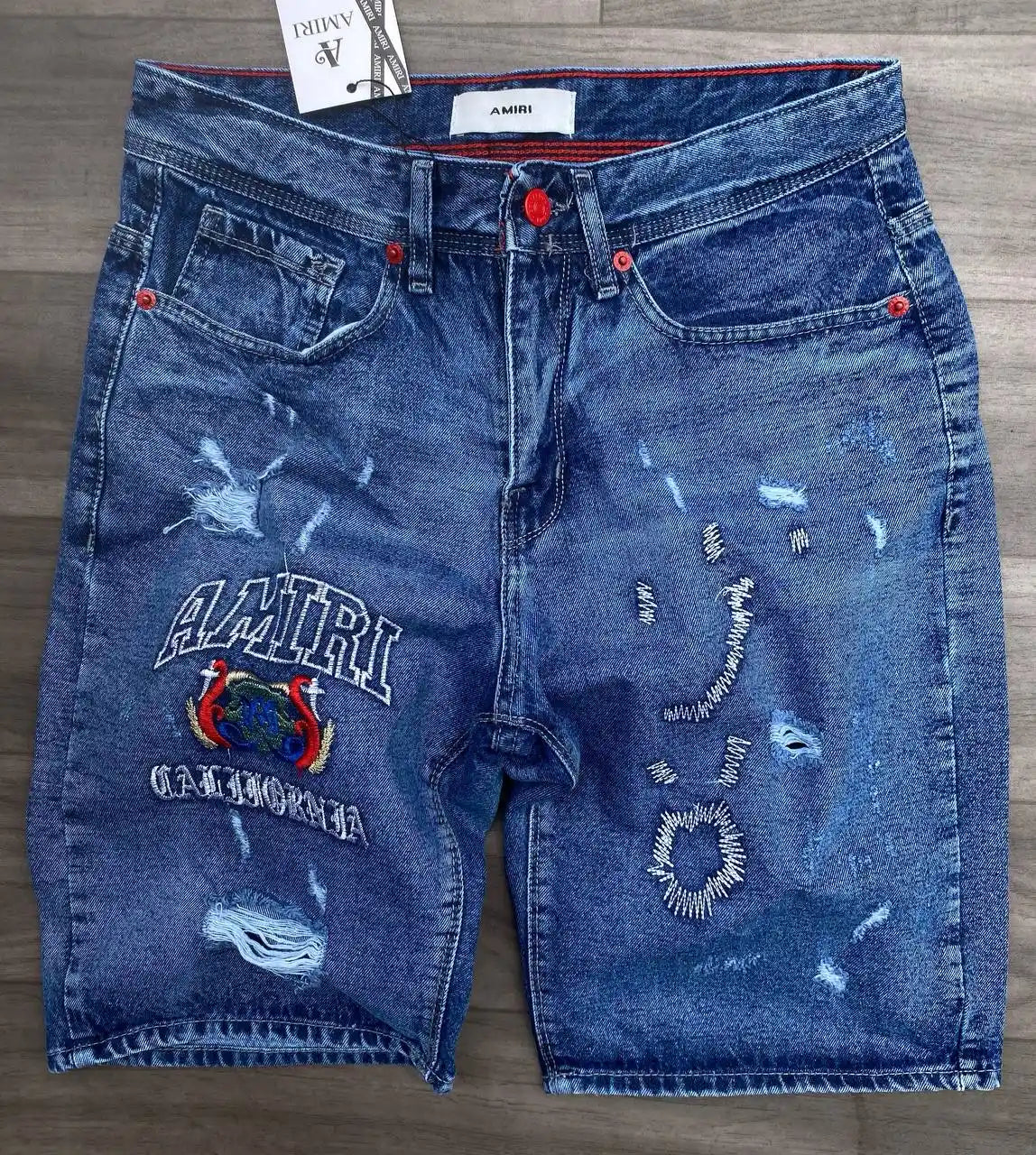 Pantalon corto amiri azul logo blanco