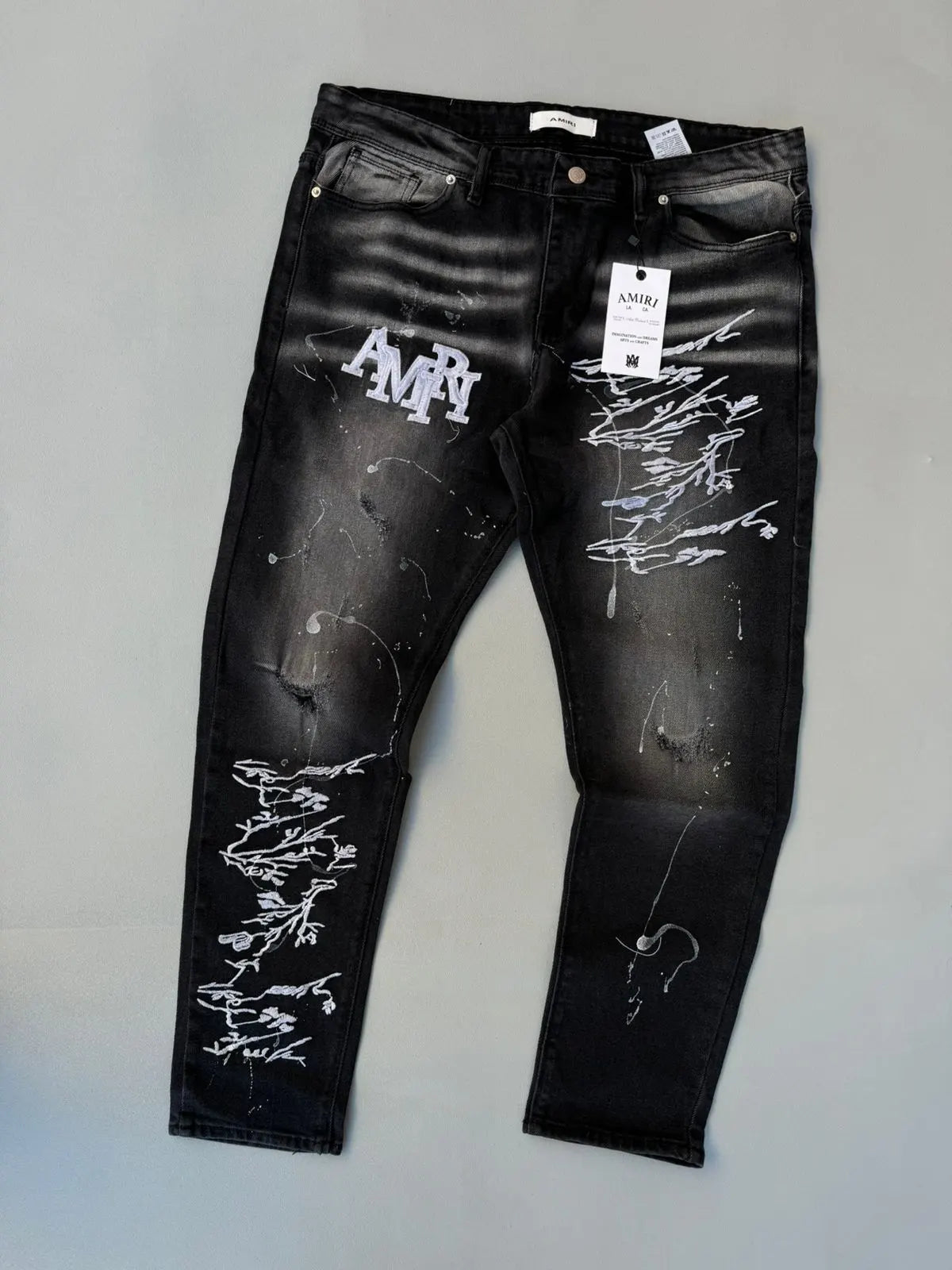 Pantalon largo amiri negro logo blanco