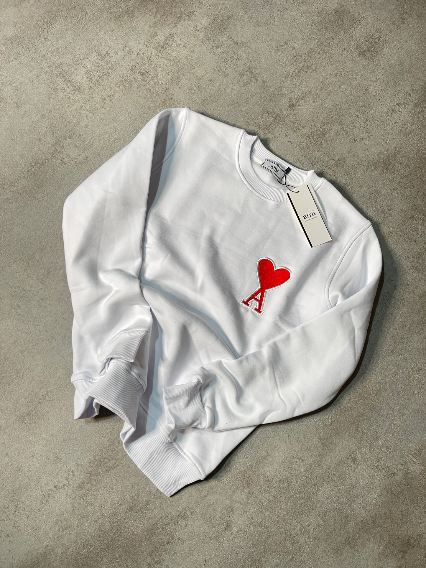 Sudadera AMI PARIS blanca logo rojo contorno blanco