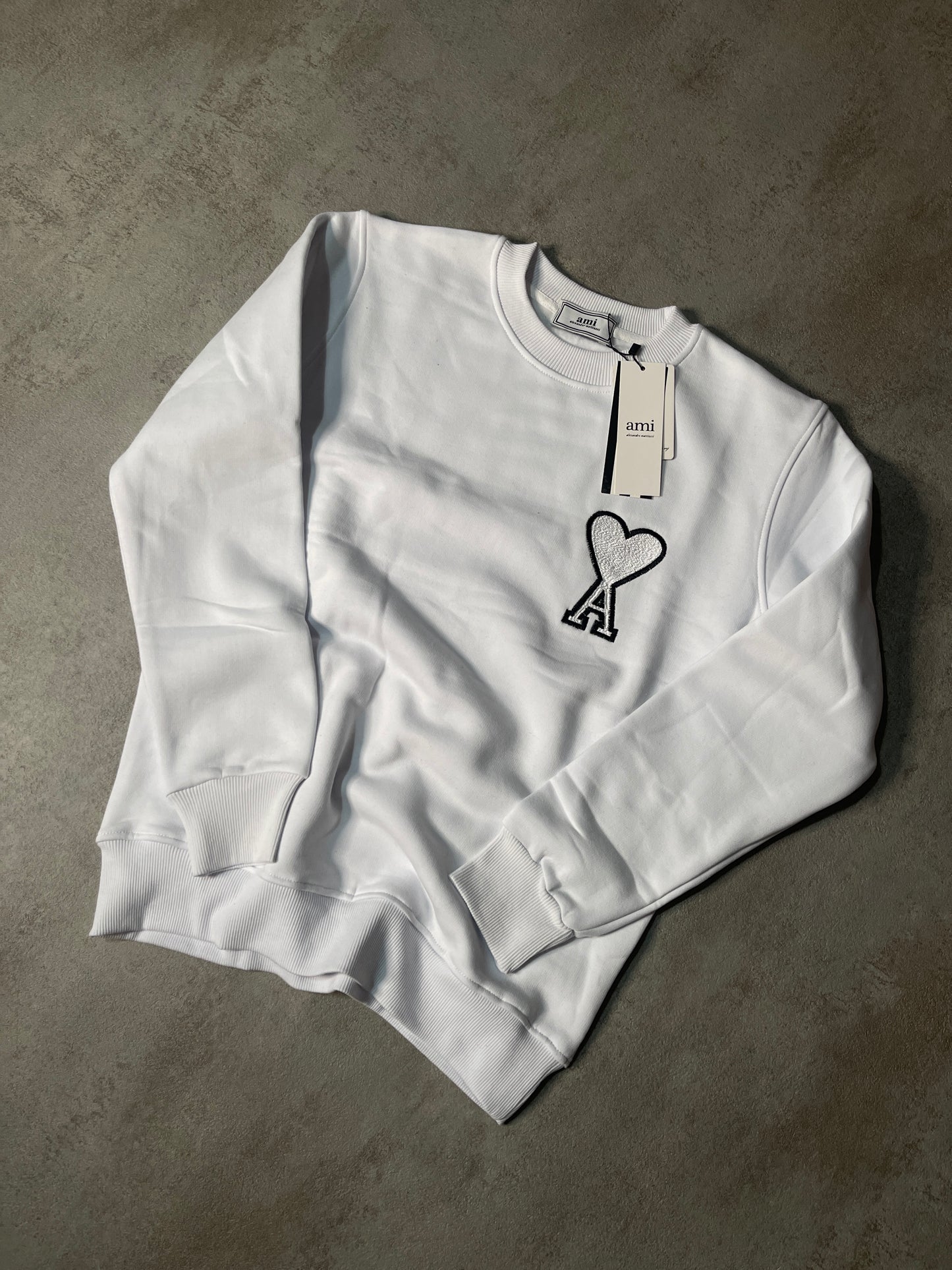 Sudadera AMI PARIS blanca logo gris contorno negro