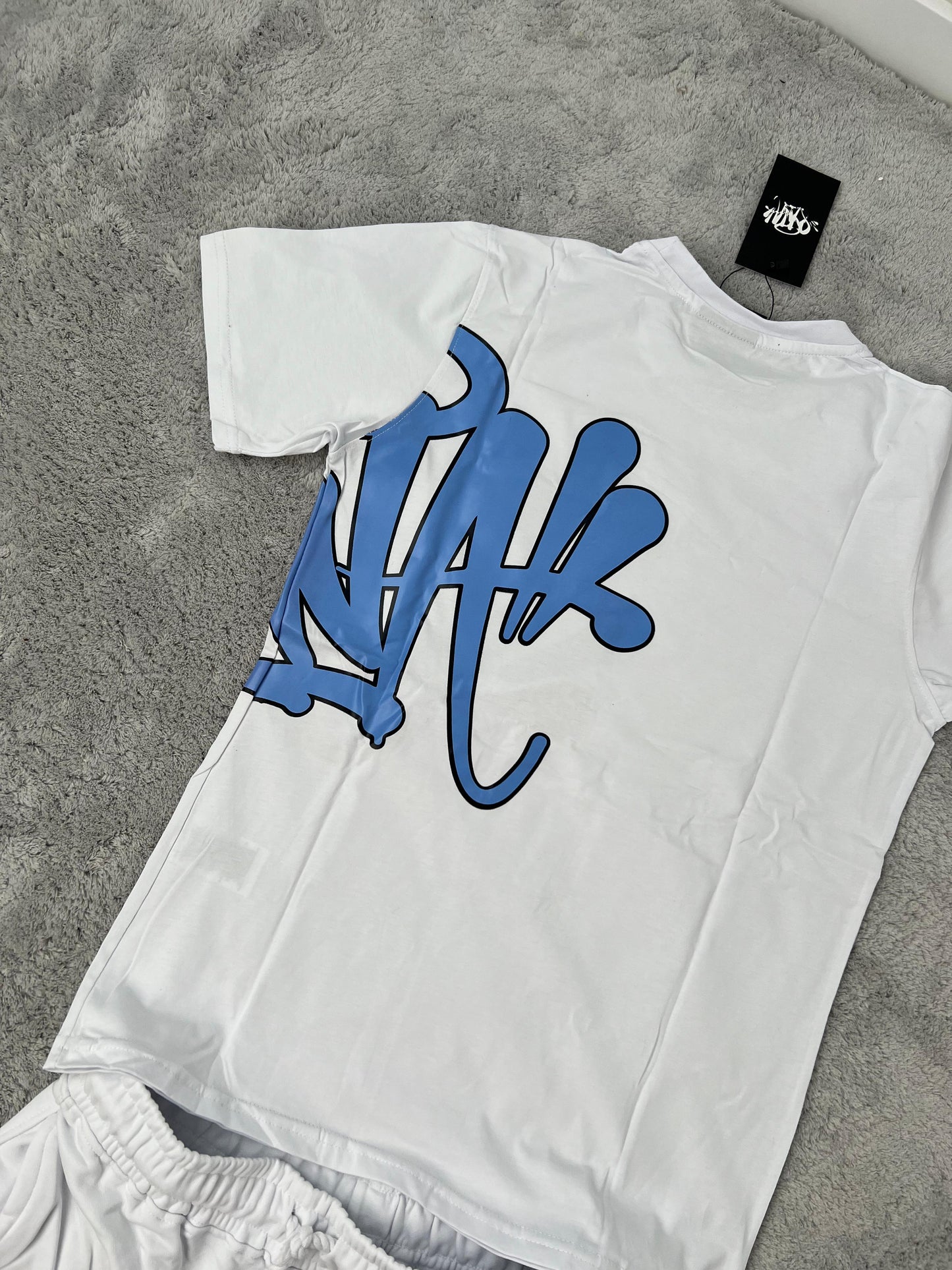 Conjunto corto syna blanco logo azul