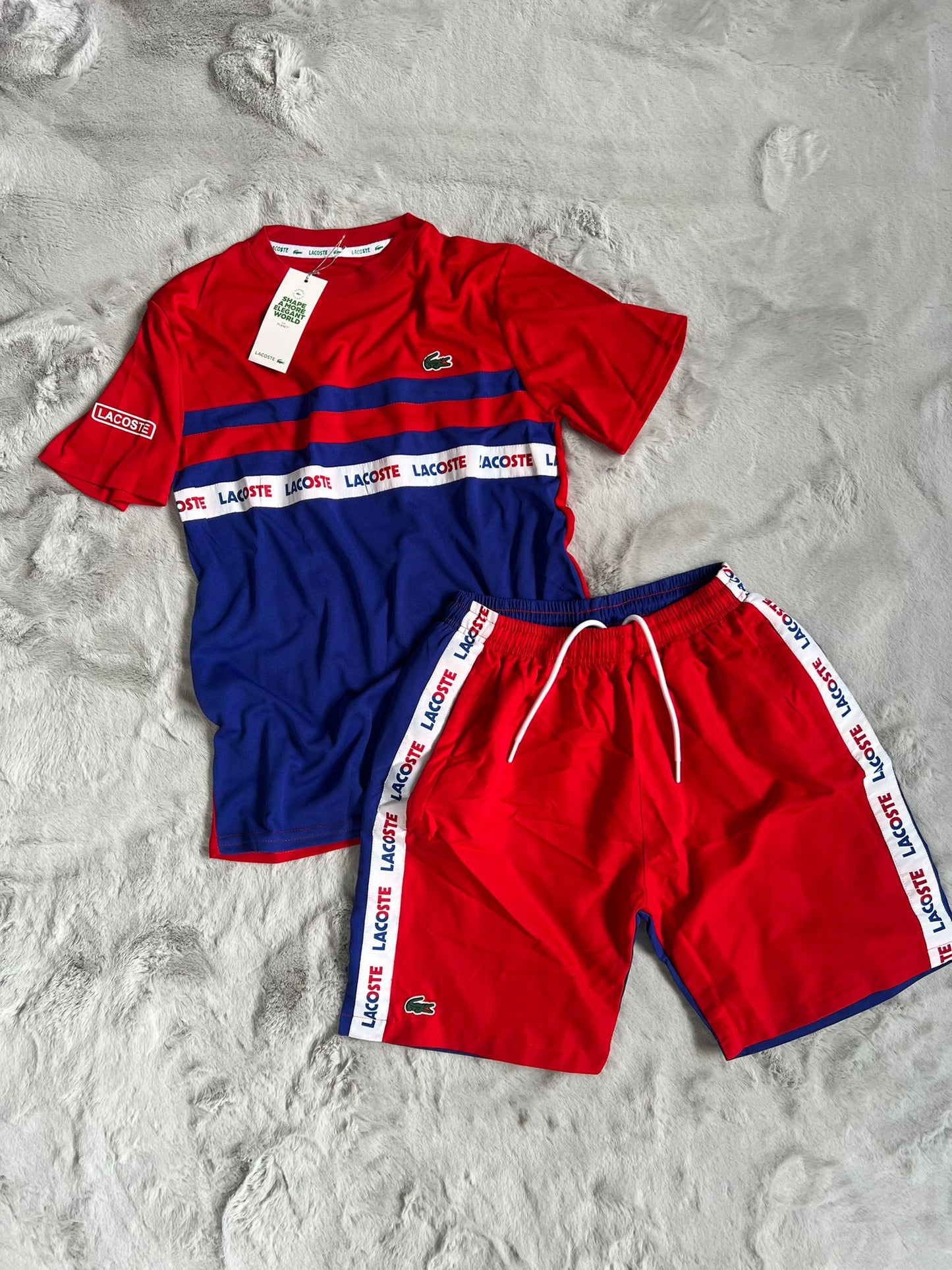 Conjunto corto lacoste azul marino y rojo logo verde