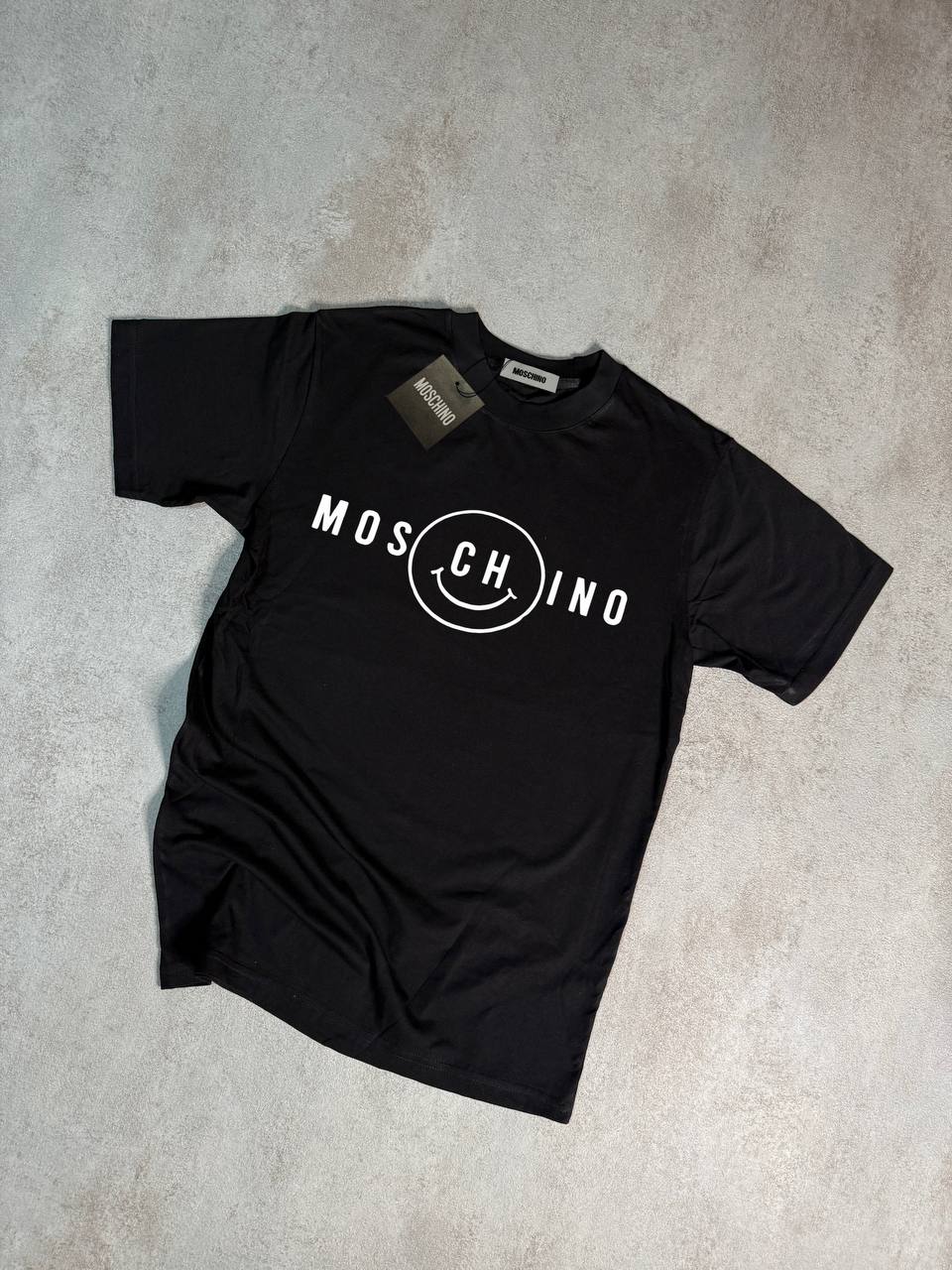 Camiseta Moschino negro logo blanco sonrisa