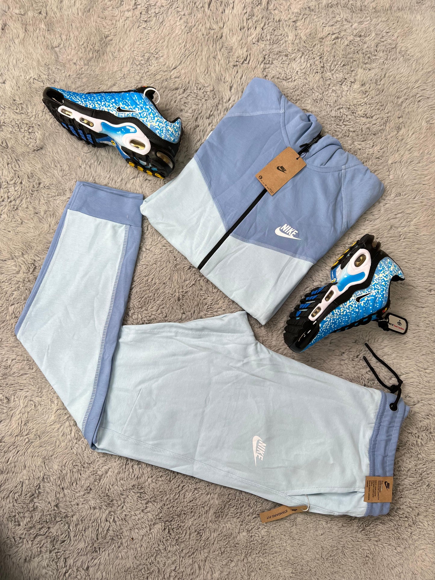 Nike tech azul logo blanco