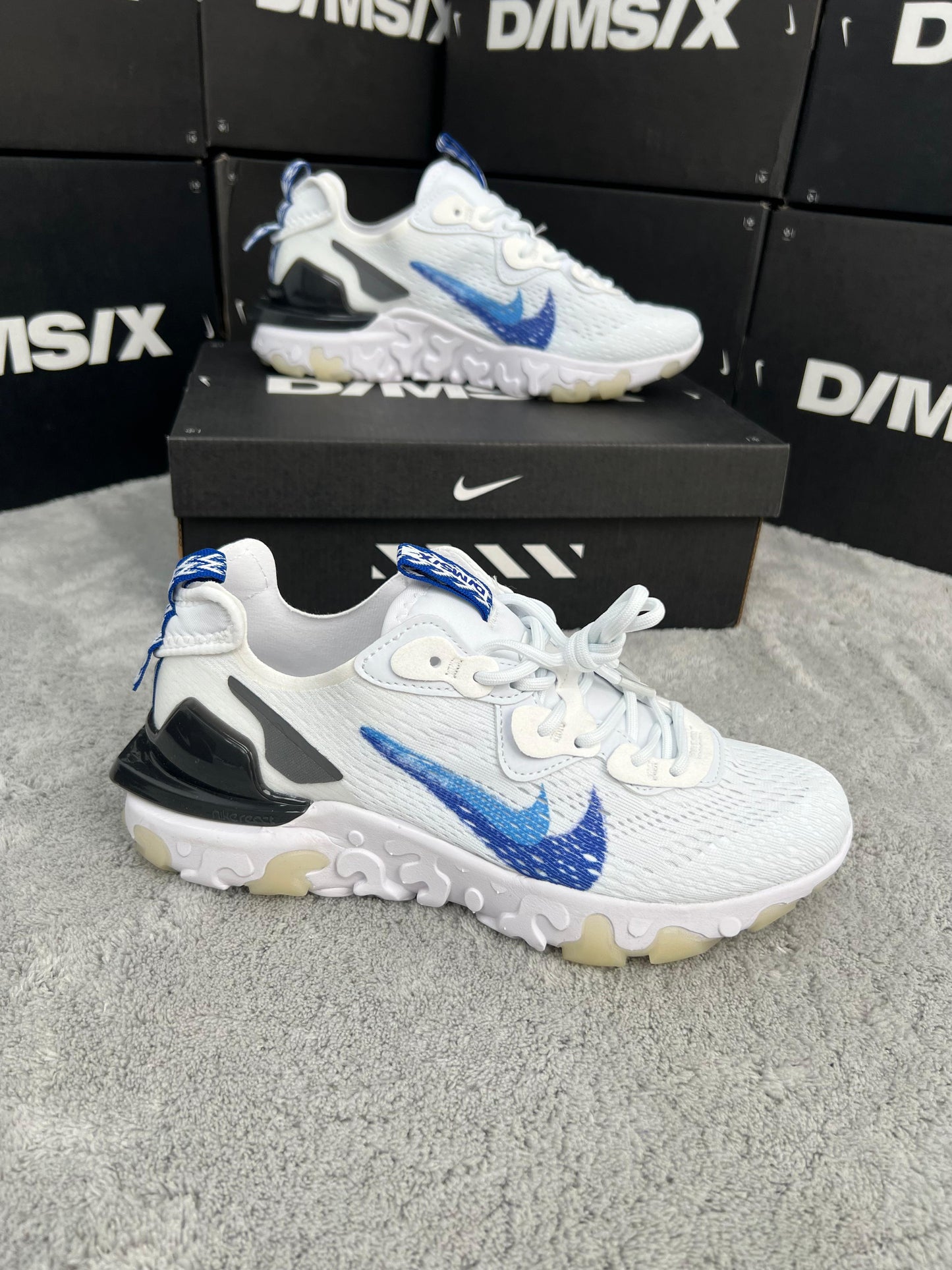 Nike react vision blancas doble logo azul