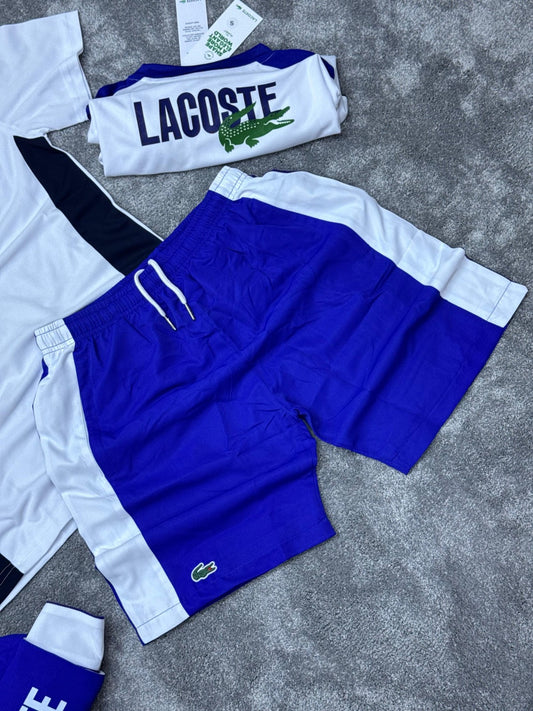 Conjunto corto lacoste blanco logo verde detalles azules