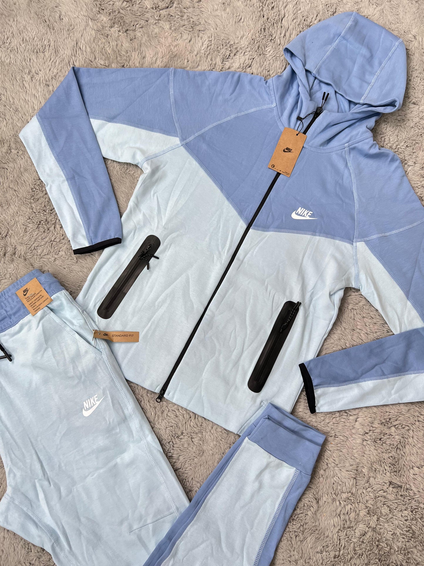 Nike tech azul logo blanco