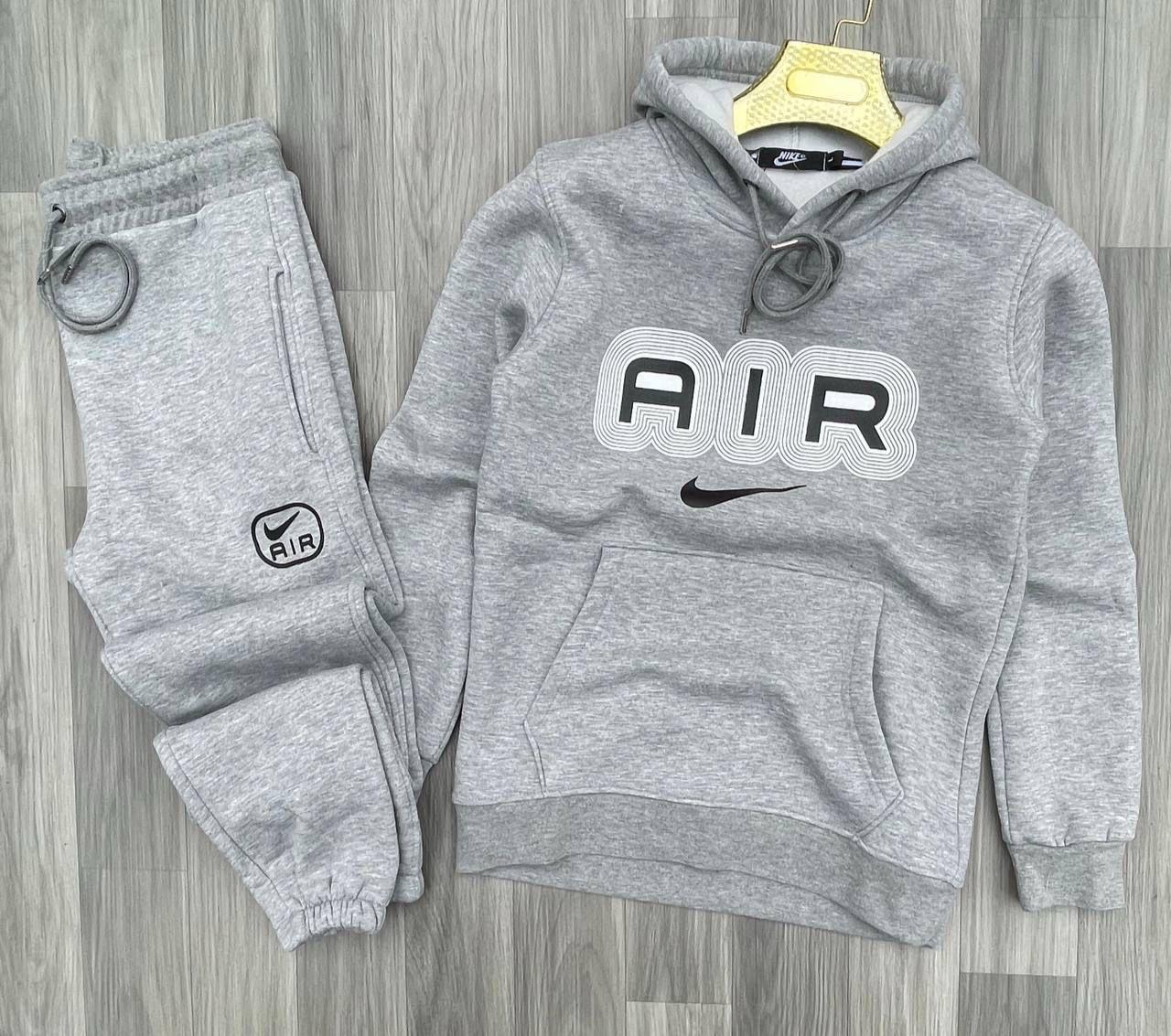Chandals nike logo central air gris