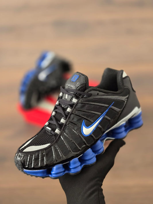 Shox negra suela azul logo blanco