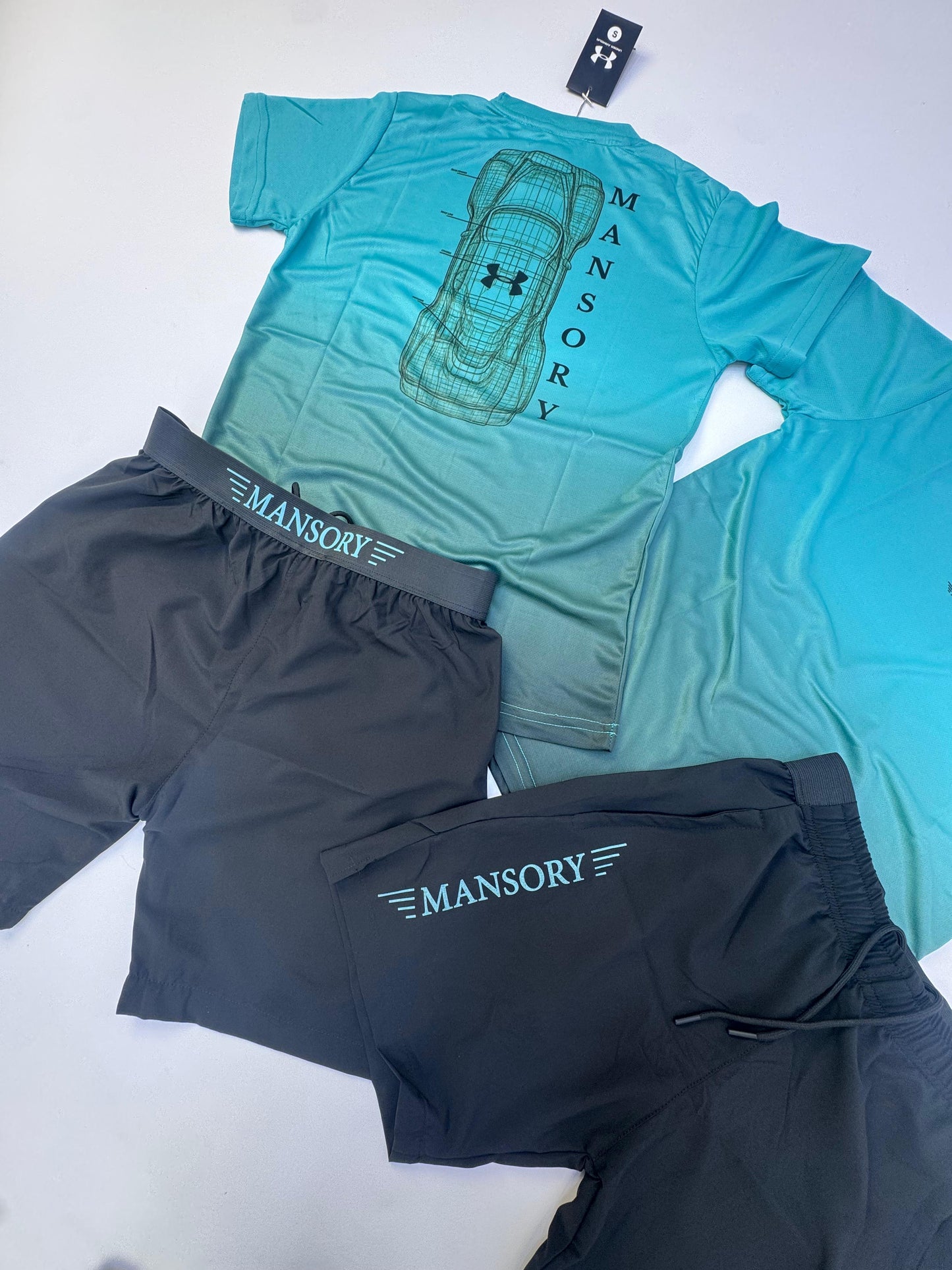 Conjunto corto Under Armour azul degradado x Mansory logo negro
