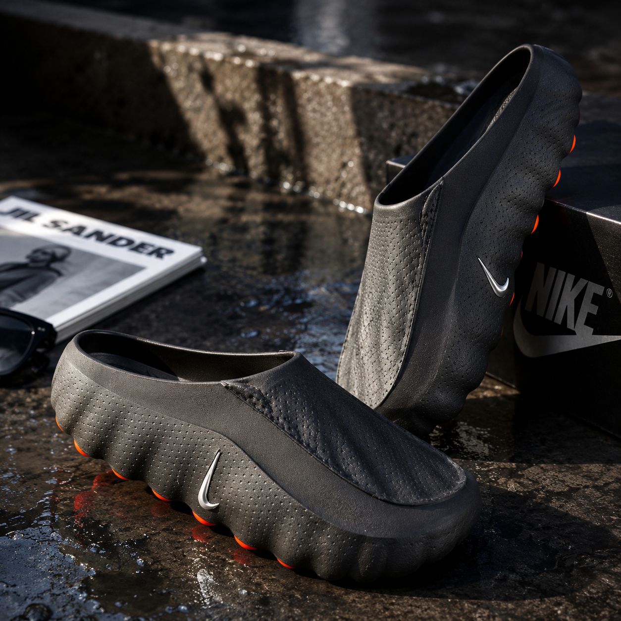 NIKE CALM MULE NEGRAS LOGO PLATEADO