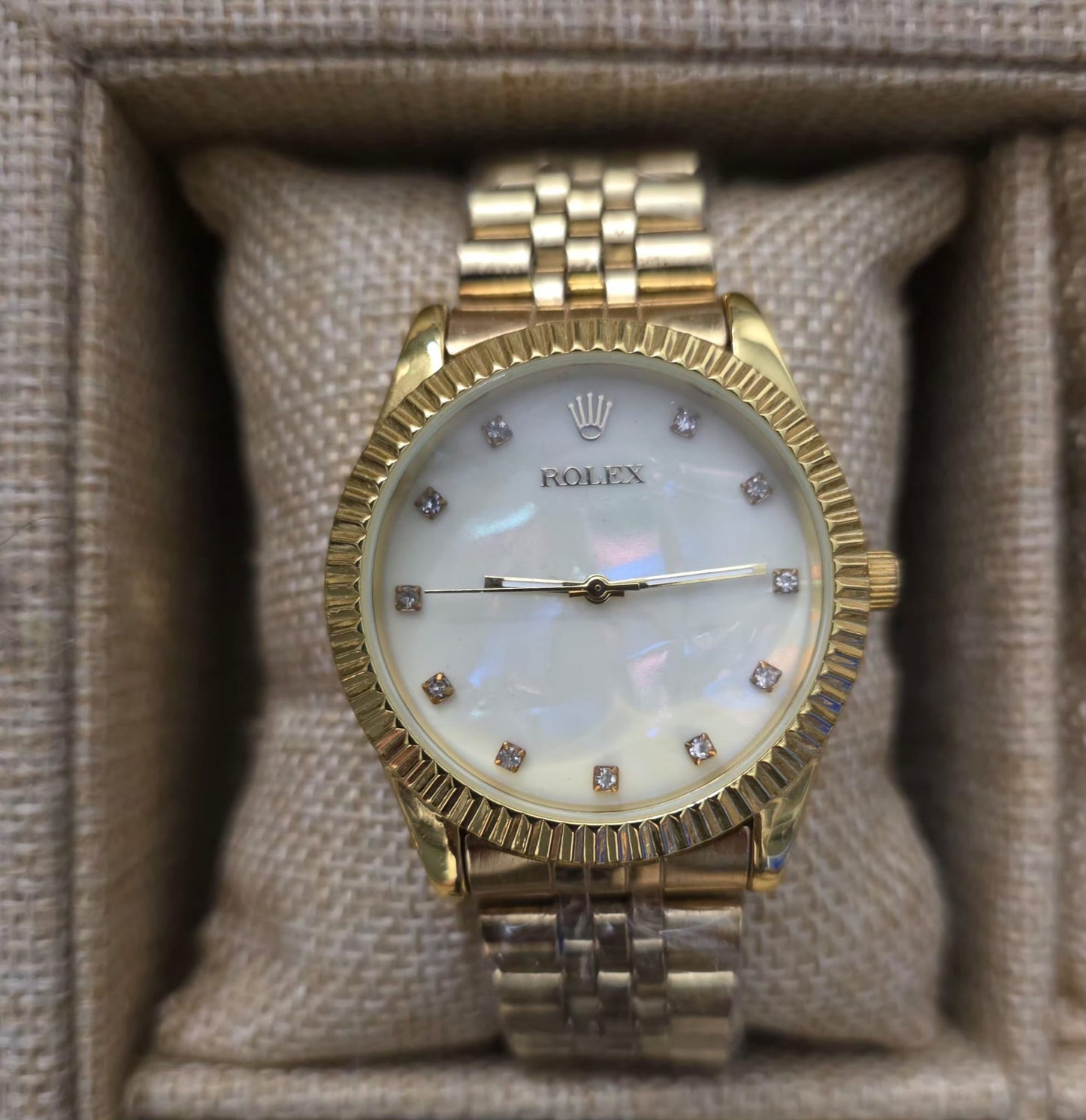 Reloj rolex dorado y blanco
