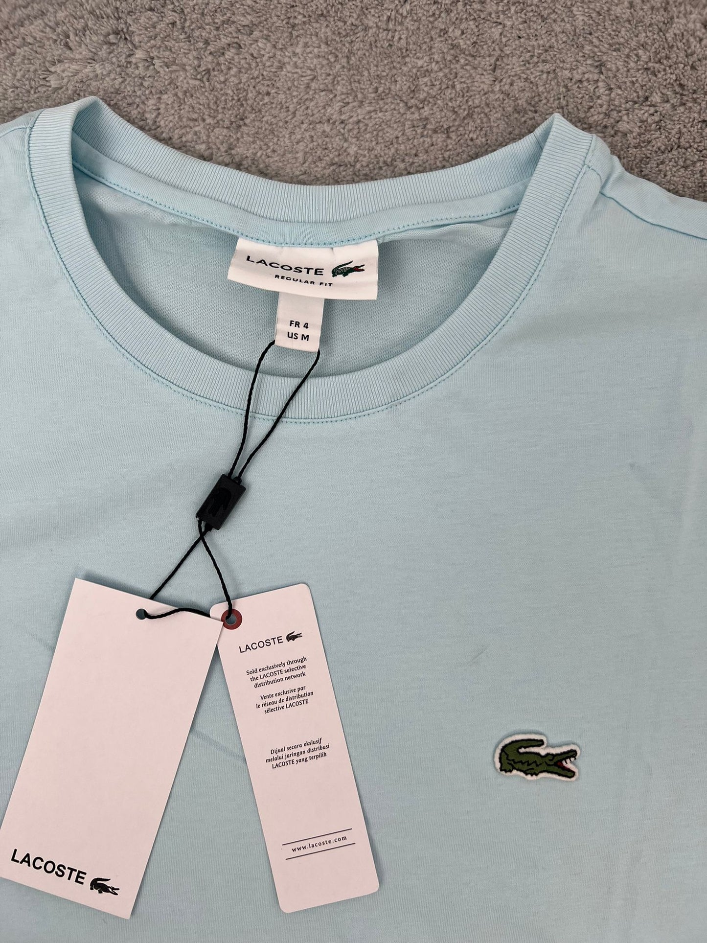 CAMISETA LACOSTE AZULL CIELO LOGO VERDE
