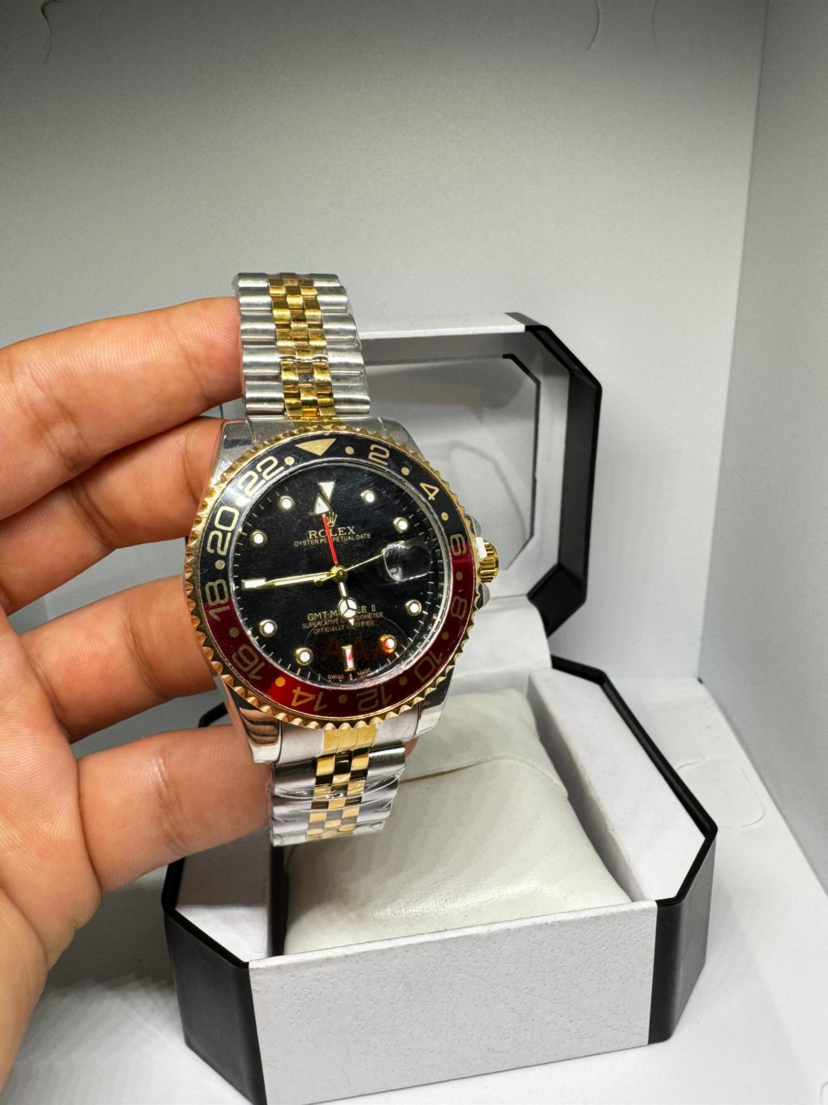 RELOJ ROLEX NEGRO Y PLATEADO DORADO