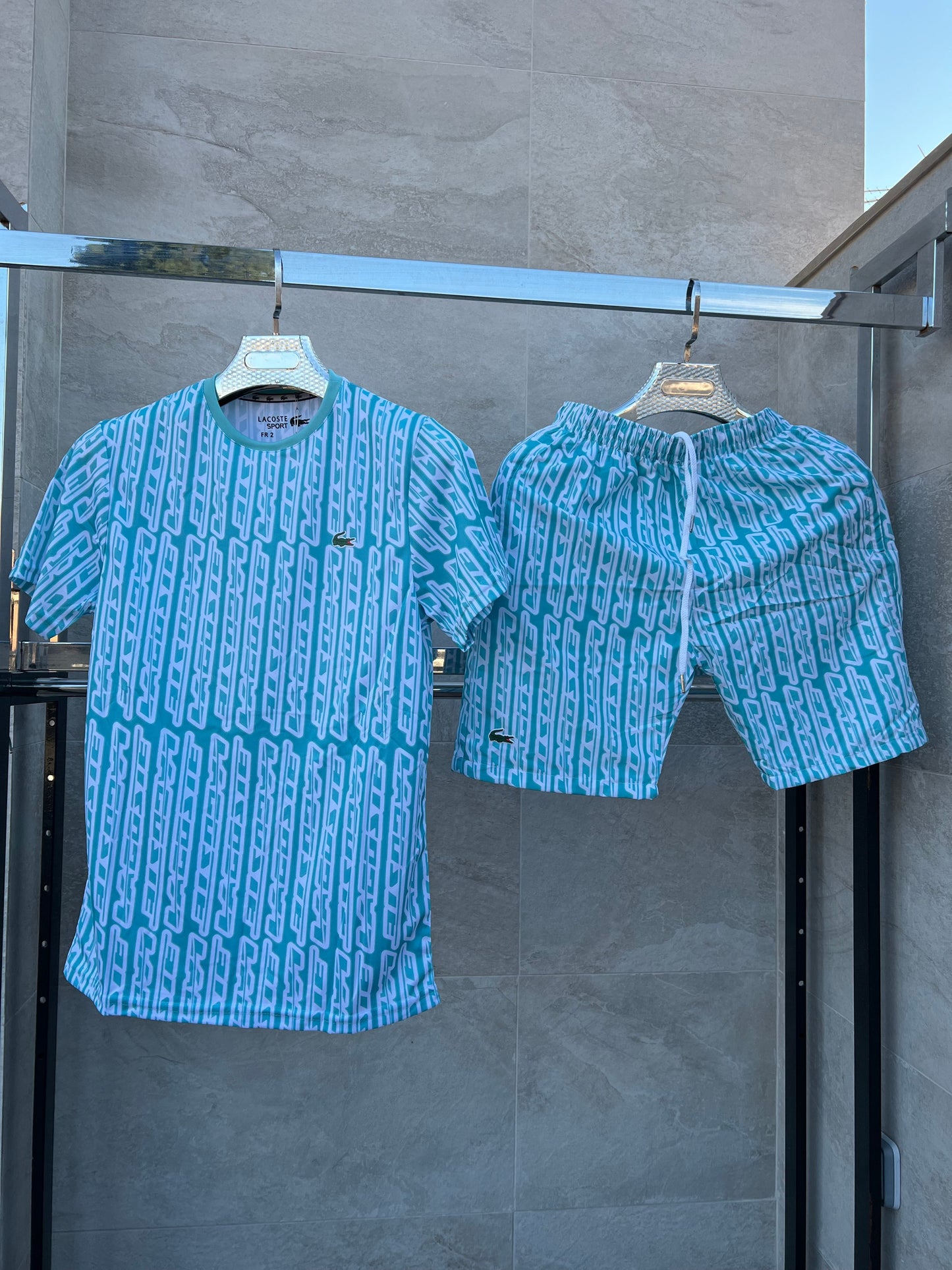 Conjunto corto lacoste logos azul claro