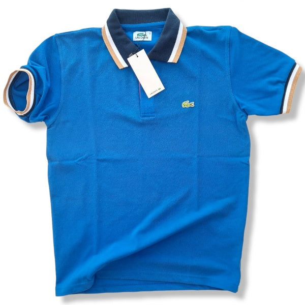Polo Lacoste azul detalles beige y azules