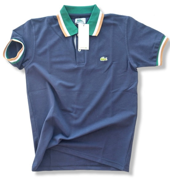 Polo Lacoste azul marino detalles beige y verde