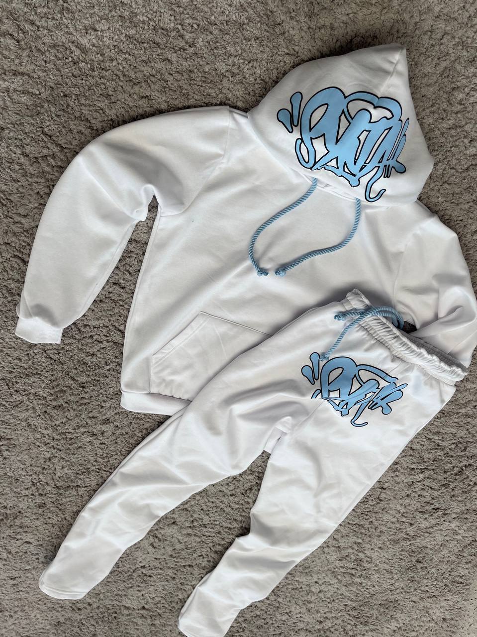 CHANDAL SYNA blanco logo azul