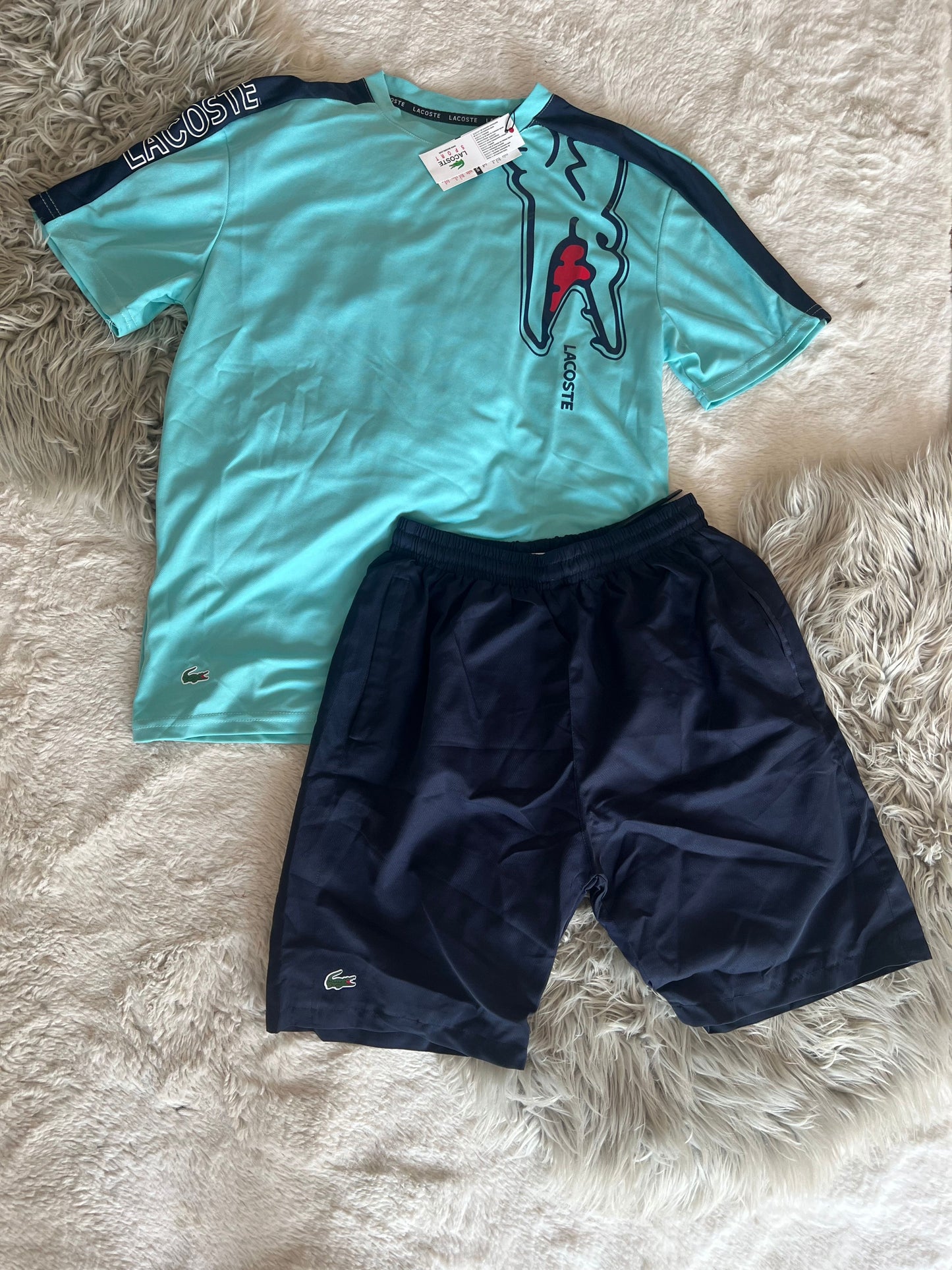 Conjunto corto lacoste azul claro cocodrilo lateral