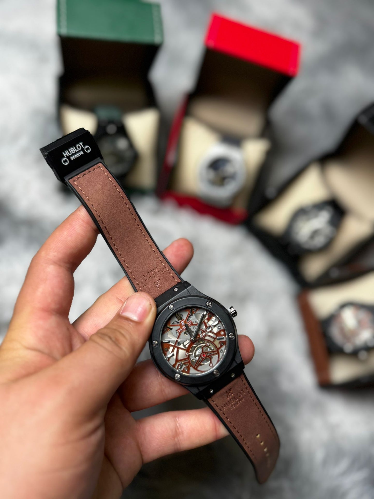 RELOJ HUBLOT negro y marron