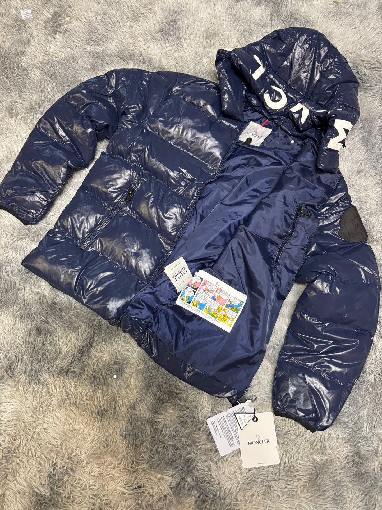 Chaqueta moncler azul marino logo blanco
