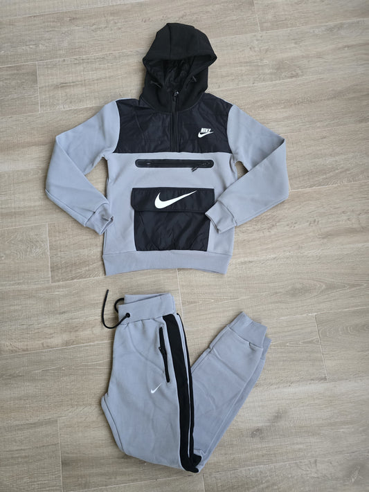 Chandals bolsillo nike gris logo blanco